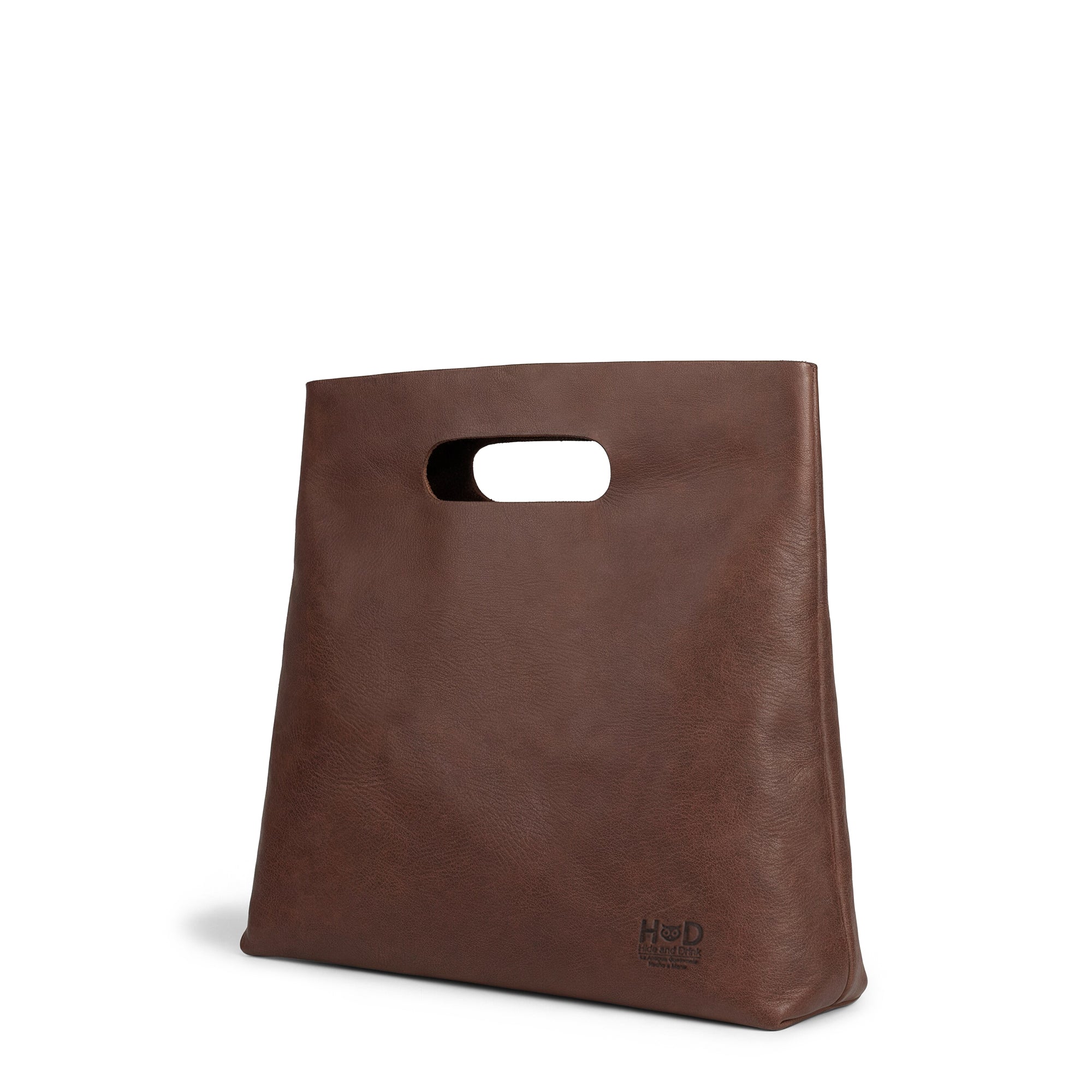 Hide & Drink Minimalist Boho Handbag made from Full Grain Leather. Stylish and versatile Minimalist Handbag for Women, featuring a rustic design that makes it a great shopping bag or tote bag. Hand cut, and hand sewn by artisans in La Antigua Guatemala & Oaxaca Mexico.