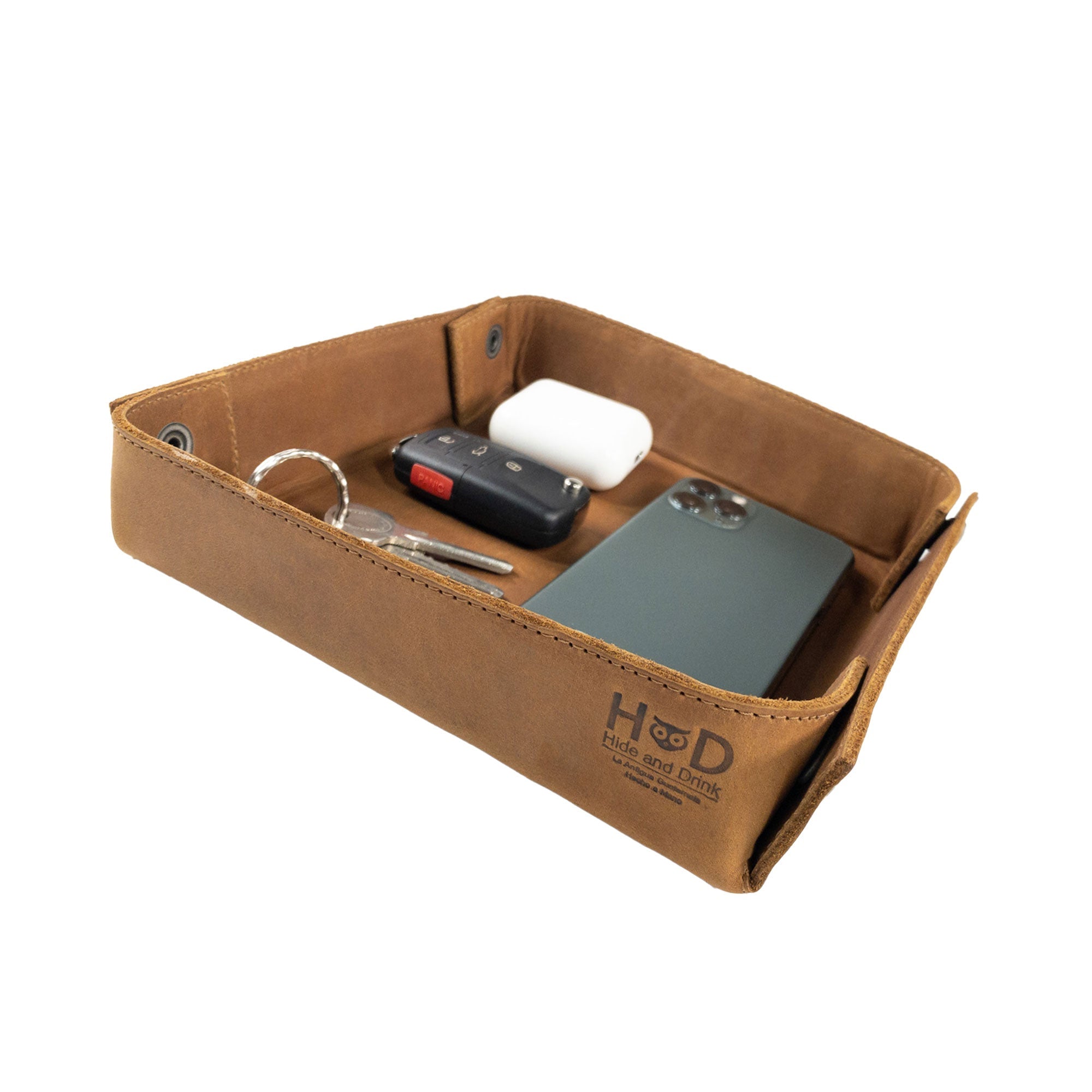 Hide & Drink Jumbo Tray crafted from rich full grain leather, ideal for organizing change and small valuables. This catchall tray is a timeless, durable piece handmade in La Antigua Guatemala.