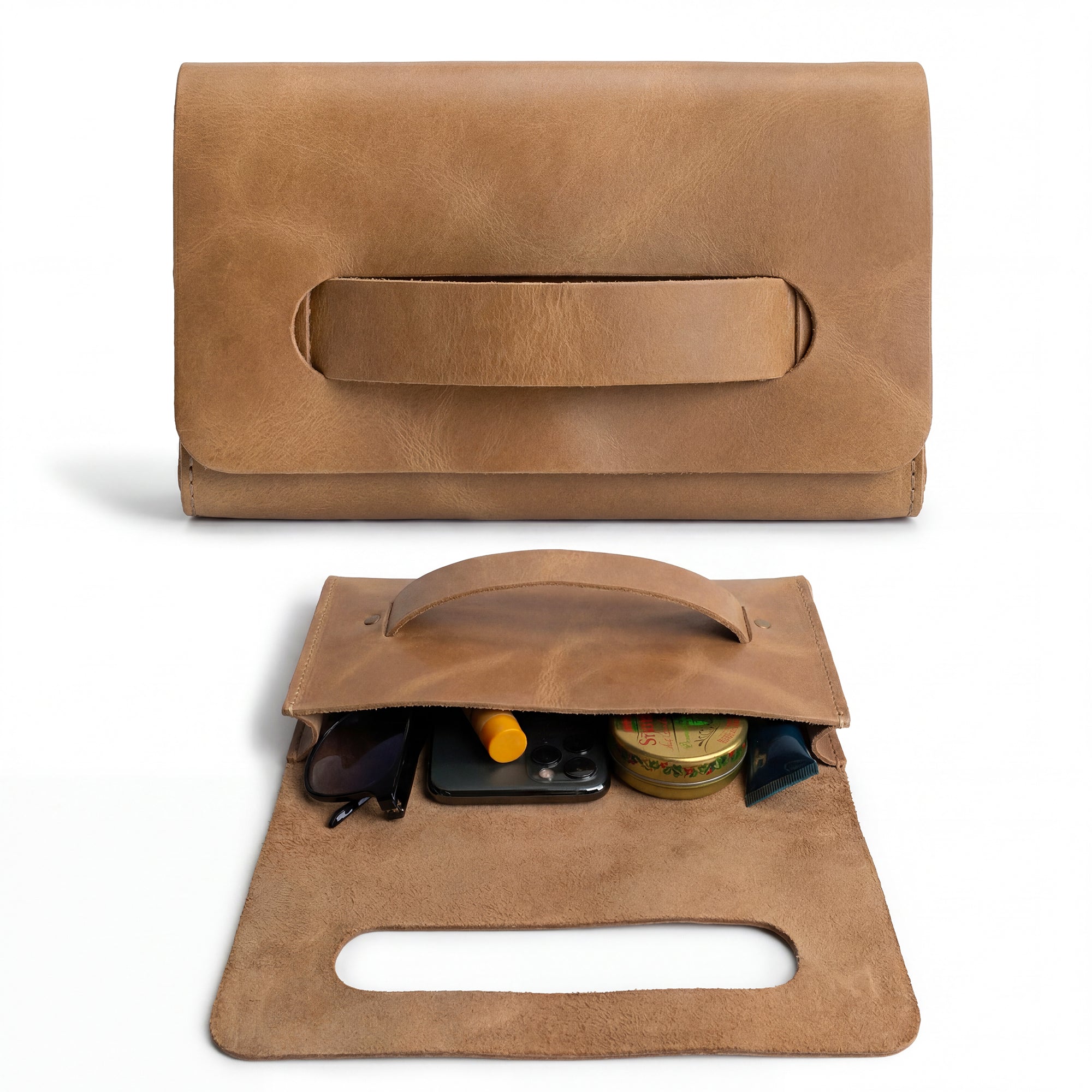Interior view of the brown Clutch Bag With Handle from Hide & Drink, featuring an organized space for essentials. This Full Grain Leather Clutch Bag with Handle is ideal for women, handmade with skill in La Antigua Guatemala & Oaxaca Mexico.