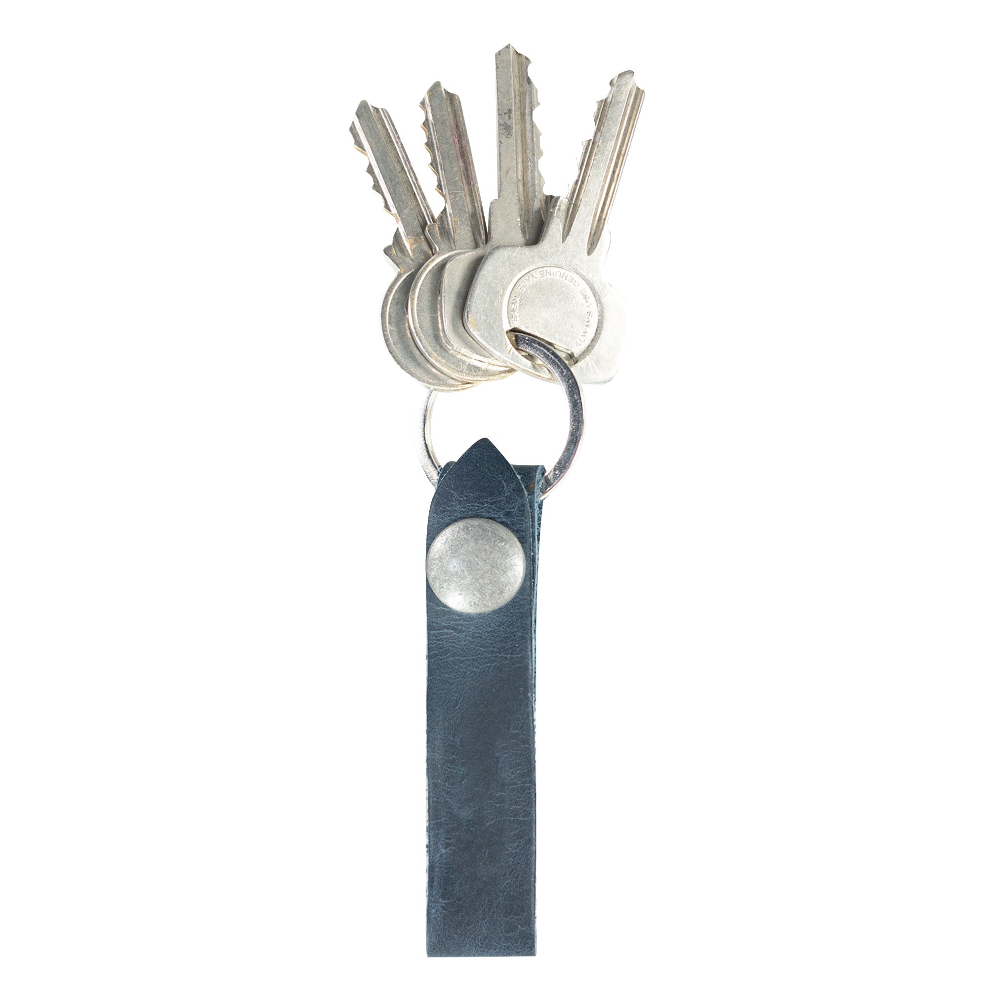 Hide & Drink Loop Keychain featuring a classic navy design perfect for key organization. This rustic keychain with belt loop is handmade from full grain leather by artisans in La Antigua Guatemala & Oaxaca Mexico.