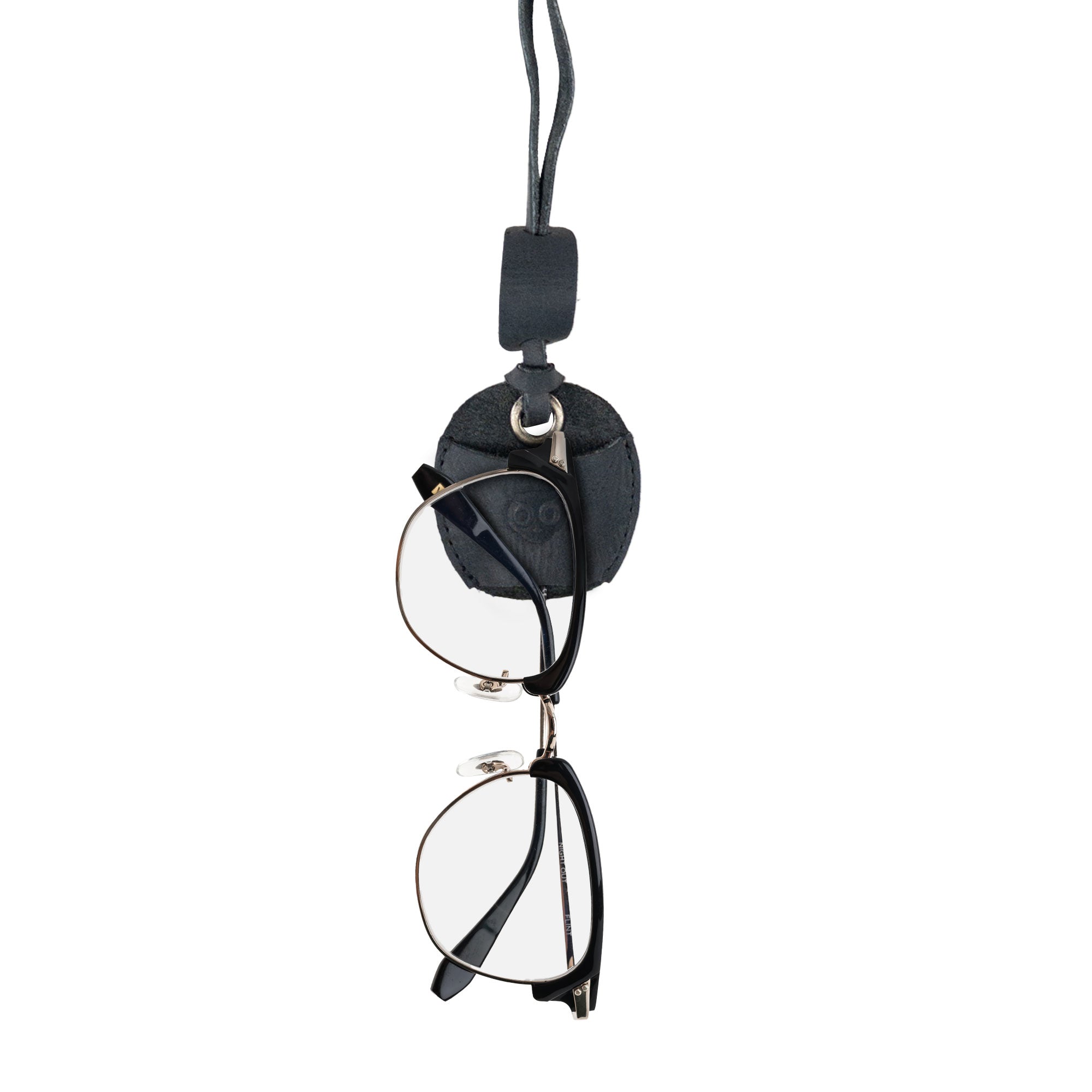 Hide & Drink Eyeglasses Holder featuring a chic neck strap design for easy access to eyeglasses. This Eyeglasses Holder is suitable for both men and women, crafted from durable full grain leather. Handmade in La Antigua Guatemala & Oaxaca Mexico.