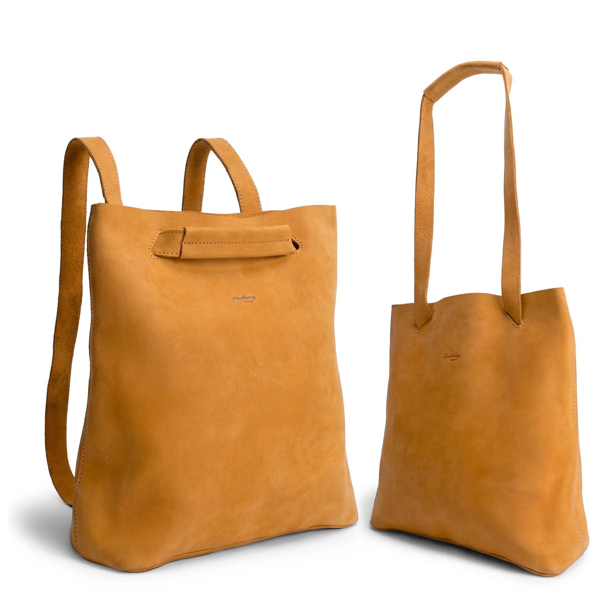 Convertible Backpack to Shoulder Bag by Heather's showcases its versatile design, transitioning from a spacious crossbody for women to a squared purse. This bag is made of Full Grain Leather and exemplifies small batch production, being hand cut, hand sewn, and fire branded by artisans. Handmade in La Antigua Guatemala & Oaxaca Mexico.