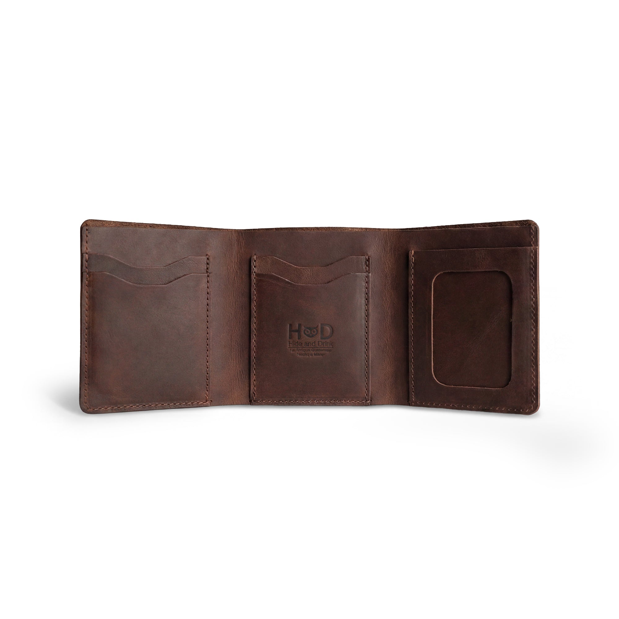 Inside of the Classic Trifold Wallet by Hide & Drink, featuring soft Full Grain Leather with a card slot. This wallet exemplifies Hand Cut and Hand Sewn craftsmanship from skilled artisans in La Antigua Guatemala & Oaxaca, Mexico.