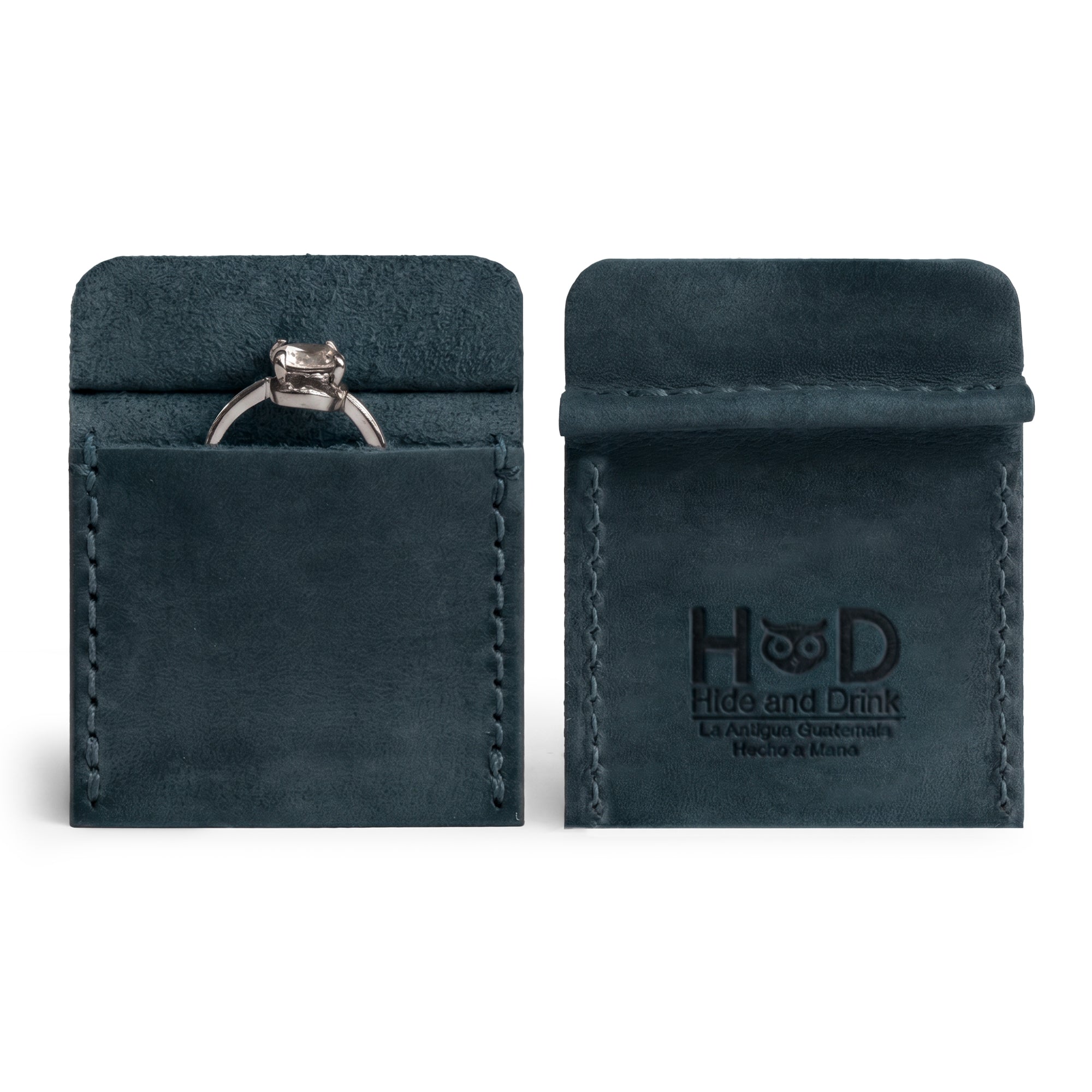 Hide & Drink Wedding Ring Case showcasing a sleek blue leather design, perfect for storing engagement rings. A pouch organizer for jewelry and travel, handmade in La Antigua Guatemala & Oaxaca Mexico with full grain leather.