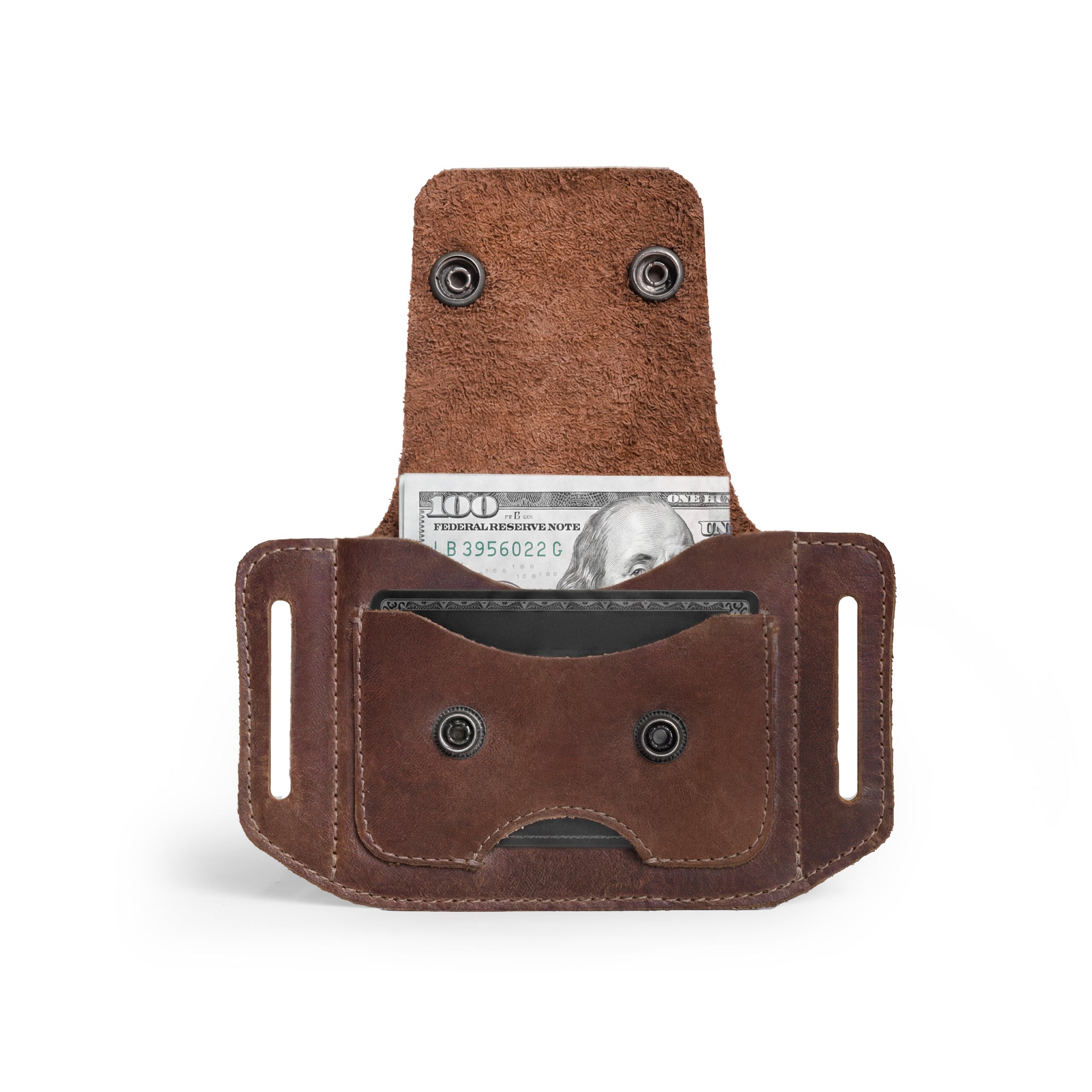 Open view of the Hide & Drink Tactical Card Holder, showing its spacious interior designed for cards and folded bills. Made from durable full grain leather, it serves as an excellent card storage solution. The product is a result of small batch production and showcases expert hand cut and hand sewn techniques coupled with fire branding. Artisan crafted in La Antigua Guatemala & Oaxaca Mexico.