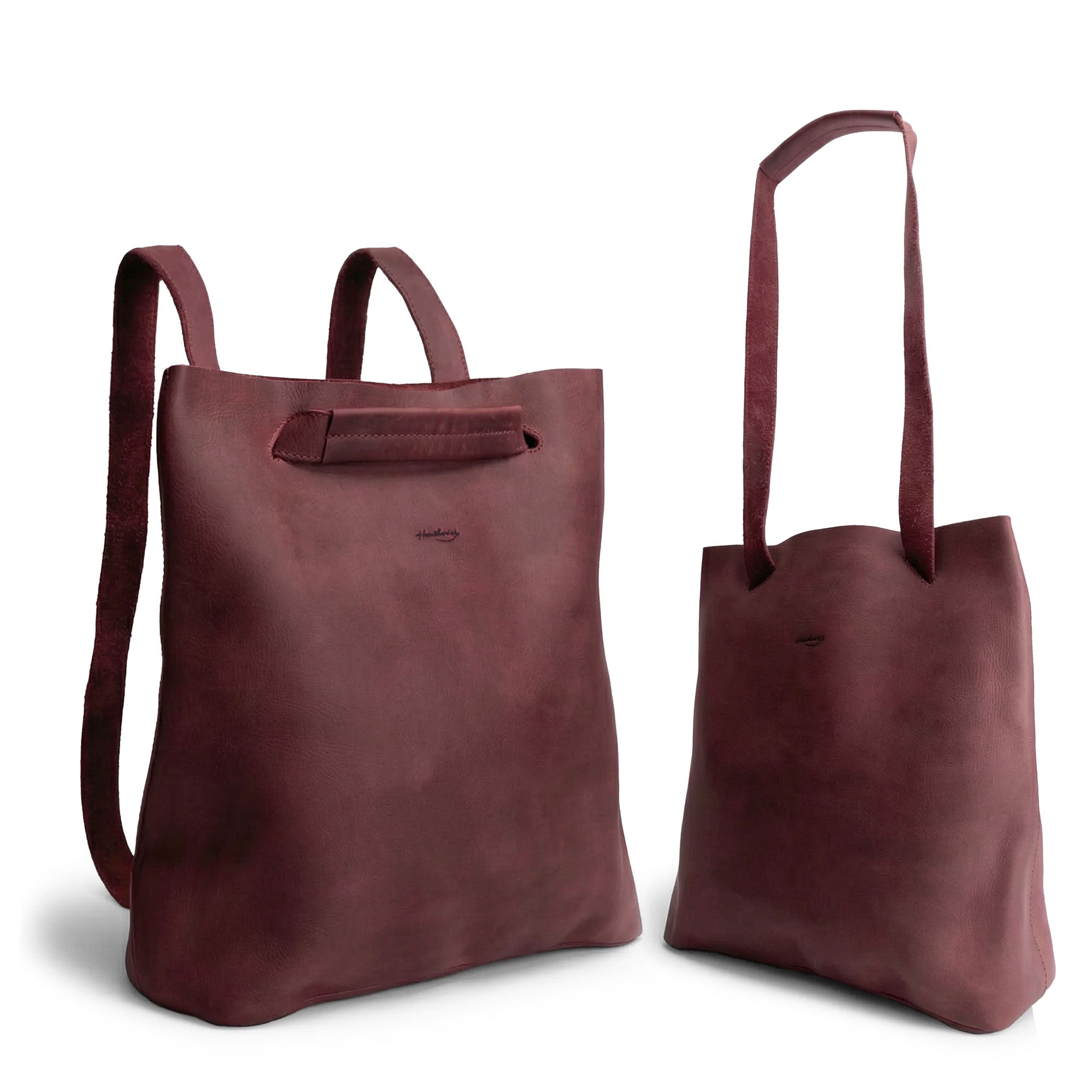 Heather's Convertible Backpack to Shoulder Bag, showcasing a stylish maroon design that converts from a backpack to a crossbody purse. This spacious crossbody for women is made of Full Grain Leather, handcrafted with small batch production techniques, ensuring a unique product that features hand cut, hand sewn, and fire branded elements. Handmade in La Antigua Guatemala & Oaxaca Mexico.