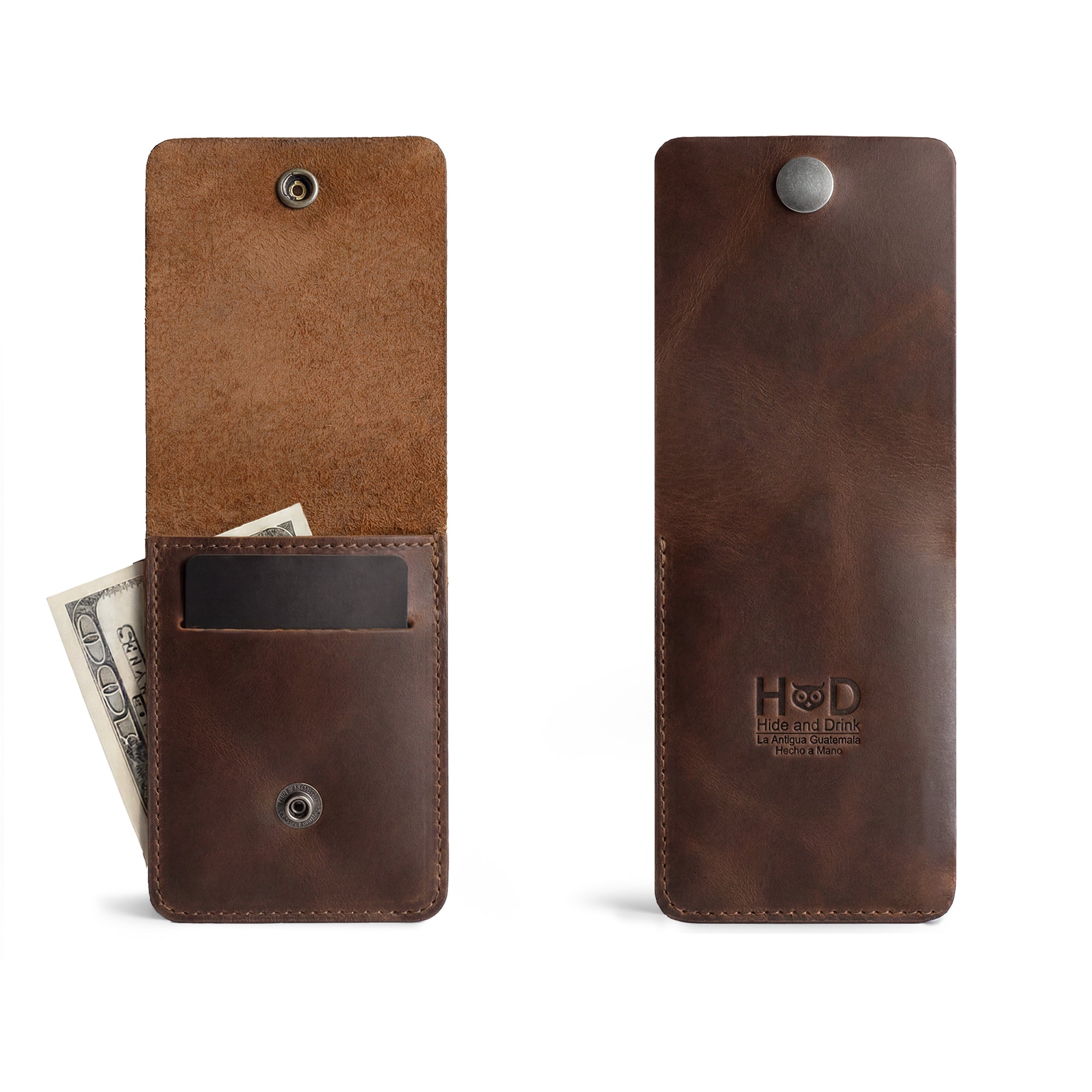 Front view of the Vertical Wallet by Hide & Drink, showcasing a snap closure in full grain leather. This Vertical Front Pocket Wallet with Card Slot offers compact storage for bills, serving as a card holder crafted in artisan style through small batch production, featuring hand cut and hand sewn details with fire branded accents. Handmade in La Antigua Guatemala & Oaxaca Mexico.