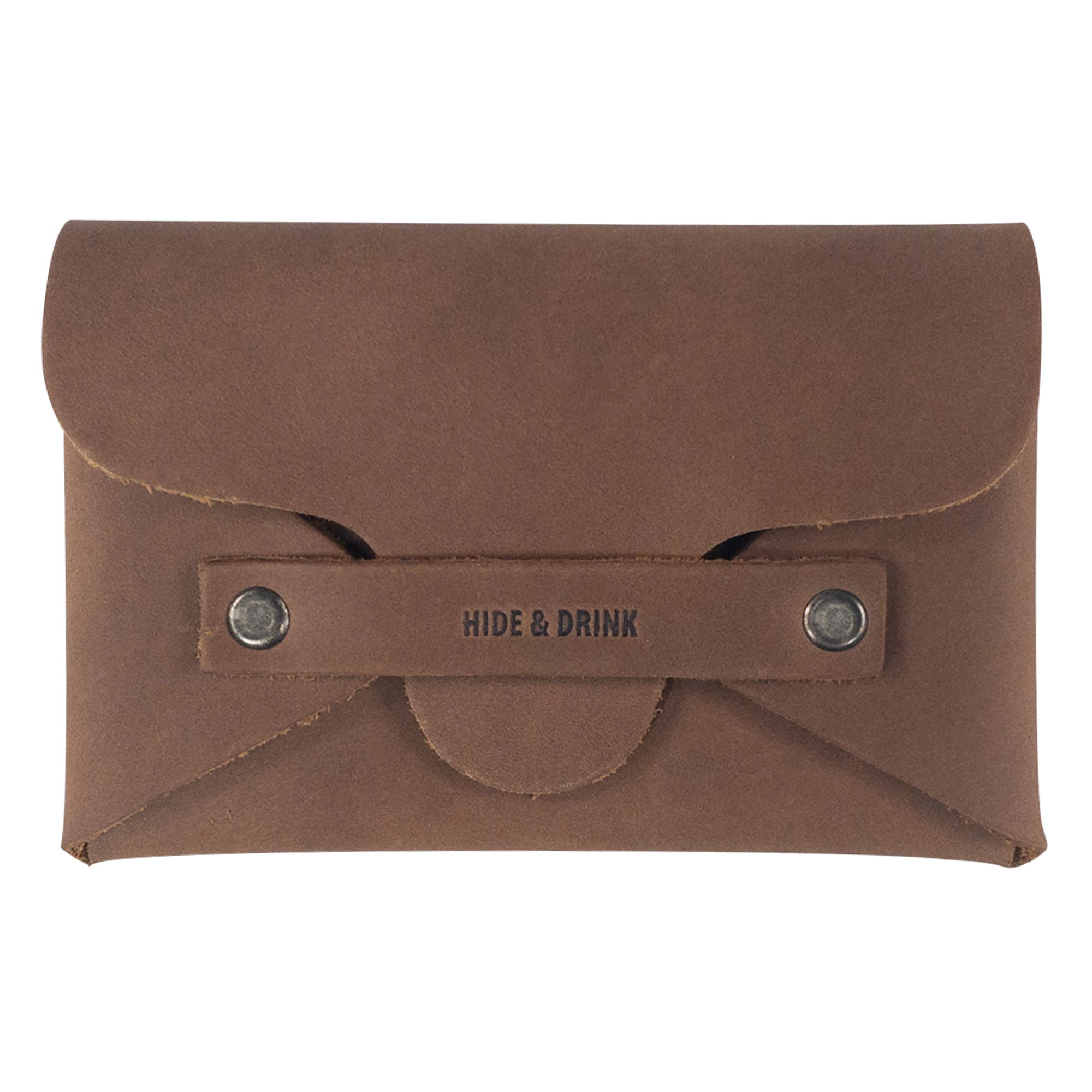 Hide & Drink presents the Snapless Business Card Holder, a vintage wallet designed for men and women. This sturdy pouch is crafted from Full Grain Leather, showcasing the brand's commitment to handmade quality in La Antigua Guatemala & Oaxaca Mexico. Perfect for organizing business cards and money, it's a must-have accessory.