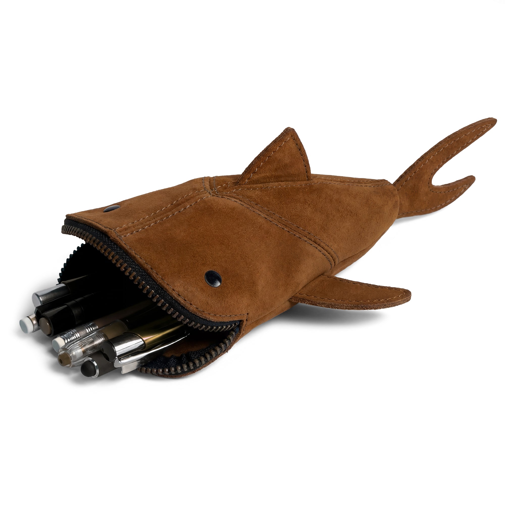 Hide & Drink Leather Shark Pouch filled with pens and crafted from premium full grain leather, perfect as a zippered coin pouch, change bag, and pencil purse, showcasing artisan quality from La Antigua Guatemala and Oaxaca Mexico.