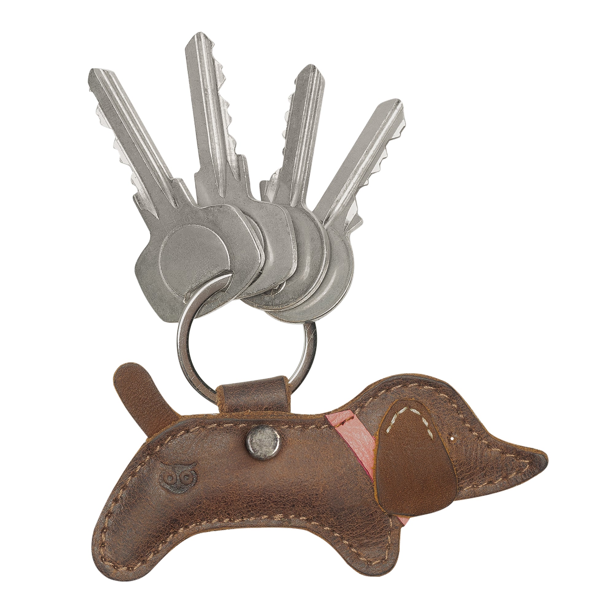 Dog-shaped Critter Key Chain by Hide & Drink, designed for animal lovers. This adorable Animal Key Ring Holder is made from Full Grain Leather, perfect for organizing your keys in style. Handmade in La Antigua Guatemala & Oaxaca Mexico.