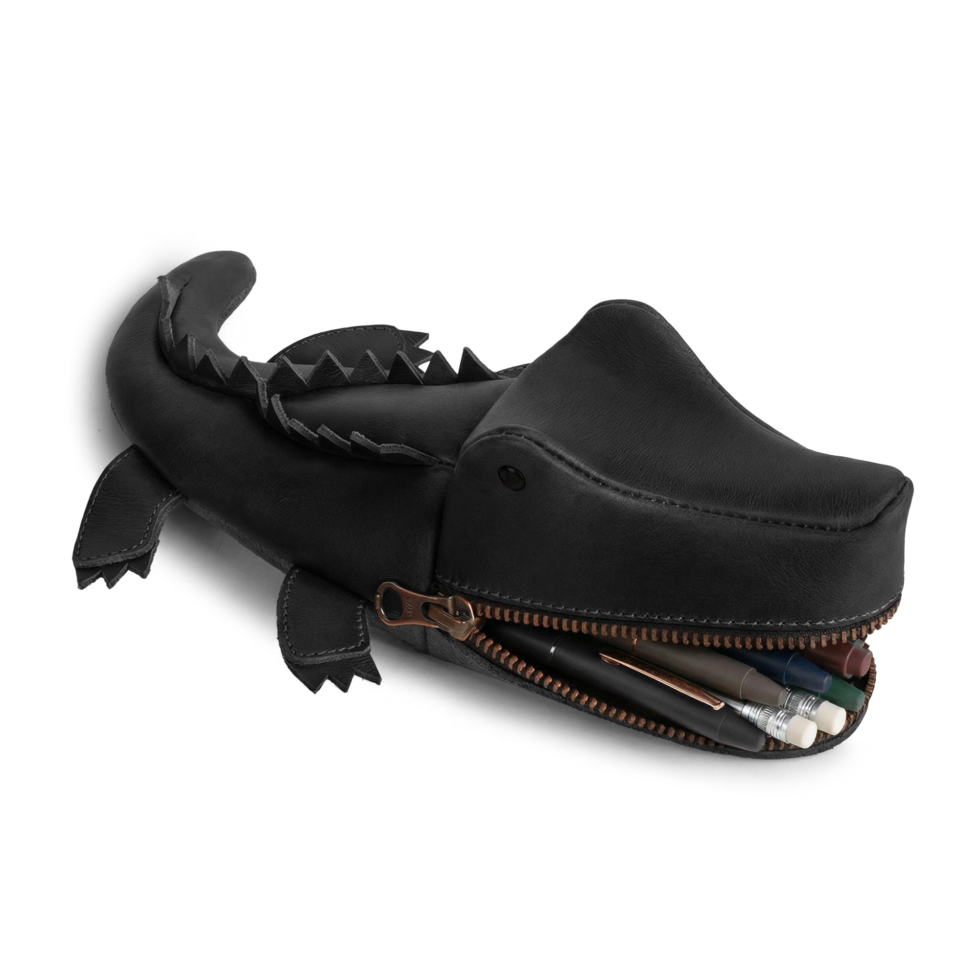 Stylish Leather Gator Pouch by Tudi Frudi, featuring a unique crocodile shape, perfect as a pencil pouch or alligator-shaped coin purse. Made from premium full grain leather with small batch production techniques, hand cut and hand sewn in La Antigua Guatemala & Oaxaca, Mexico, this versatile accessory is ideal for holding chargers, cash, or even scissors.