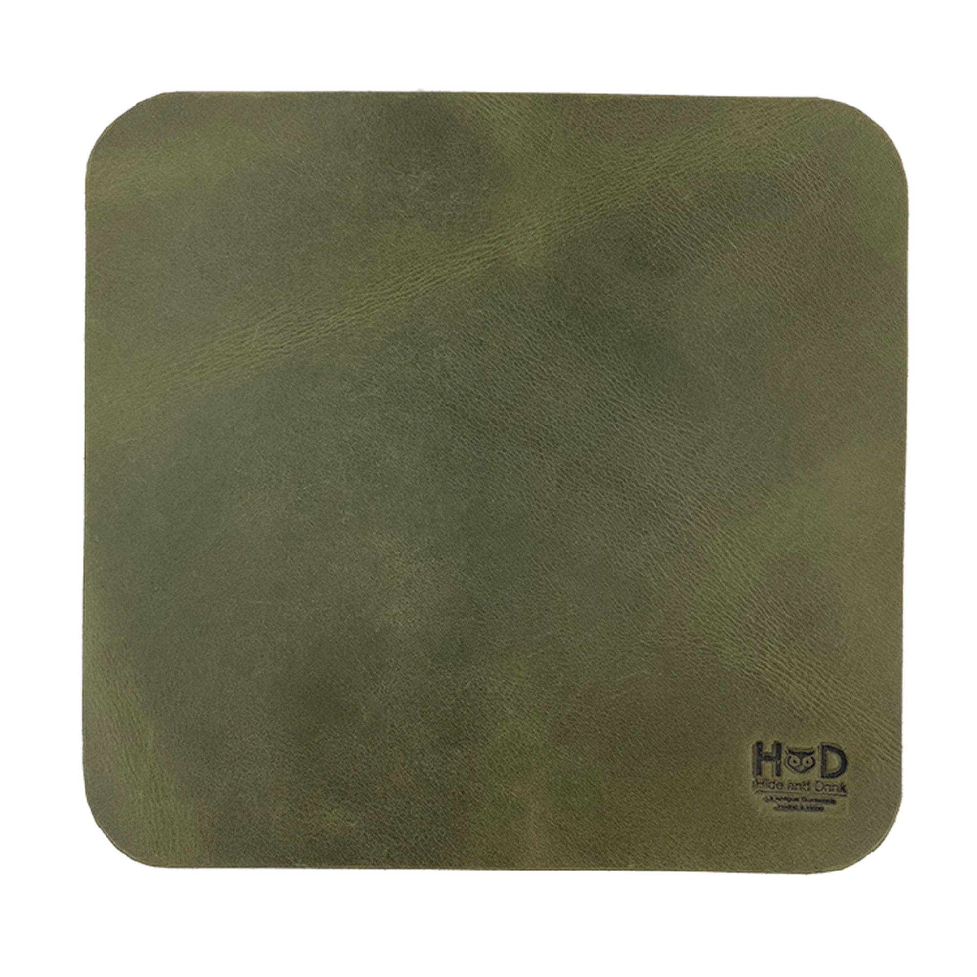 Hide & Drink Mousepad showcasing a lovely green leather finish, designed for a stylish desk setup. This anti-slip mousepad is perfect for both gaming and office use, handcrafted in La Antigua Guatemala & Oaxaca Mexico.
