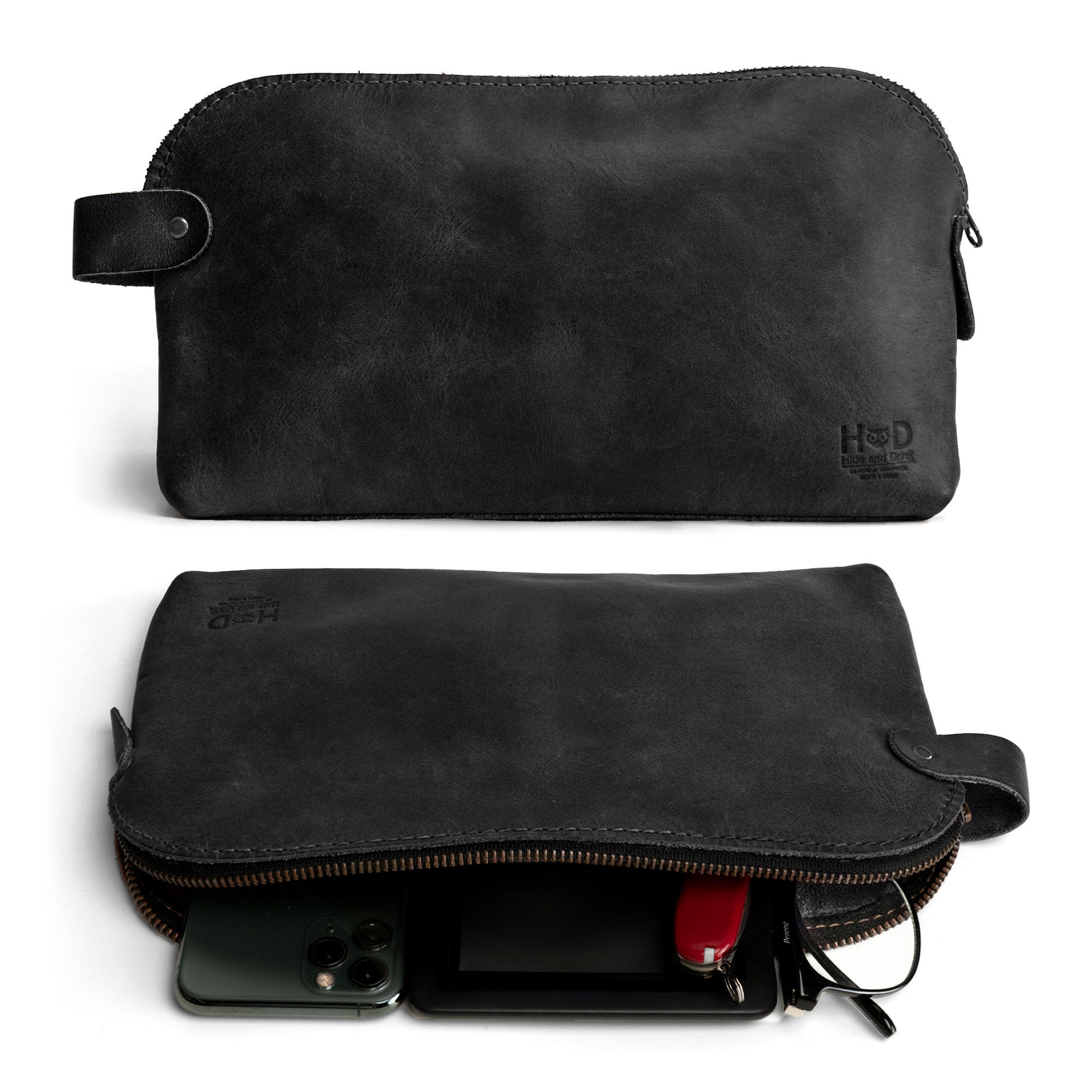 Dopp Kit Utility Bag by Hide & Drink showcasing its rich tones and artisan details. This artisan-crafted Dopp Kit Utility Bag serves as a perfect travel companion, made from premium full grain leather with emphasis on hand cut and hand sewn craftsmanship, handmade in La Antigua Guatemala & Oaxaca Mexico.