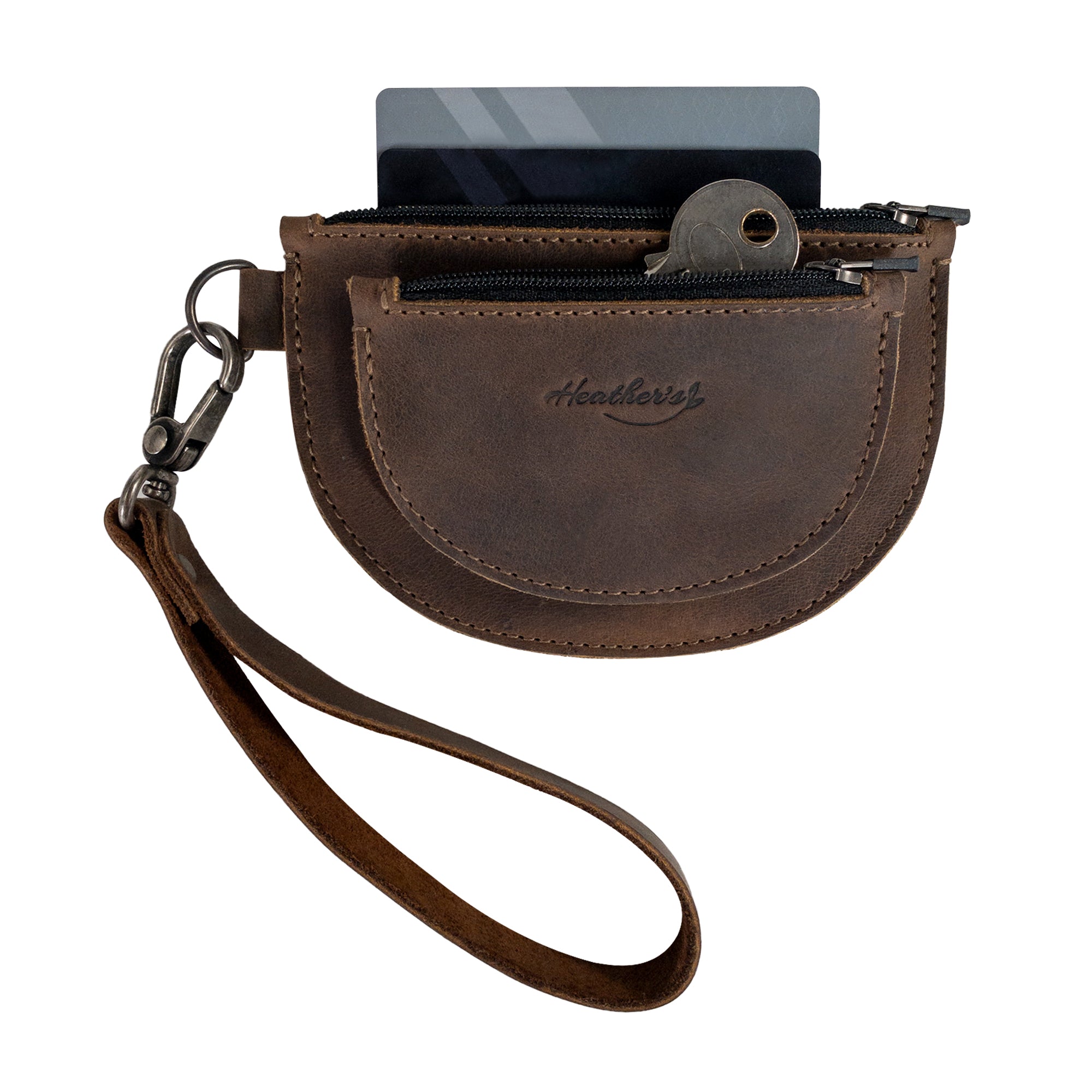 Heather's Semi-Circular Double Wallet displayed as a stylish coin pouch featuring a convenient design, made from Full Grain Leather and ideal for money holding or USB storage. This handmade wallet showcases small batch production techniques by artisans in La Antigua Guatemala & Oaxaca Mexico.