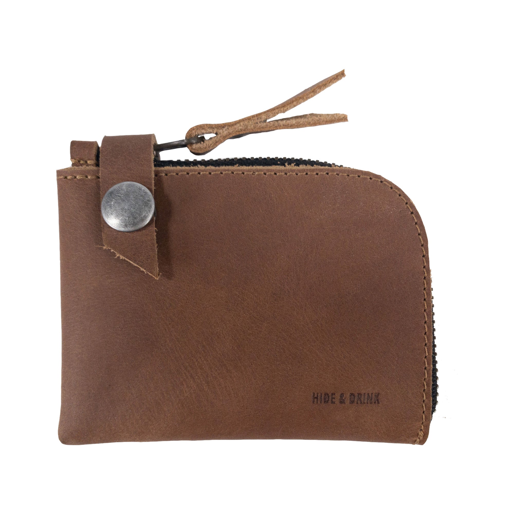 Interior view of the Lion's Mane Zippered Wallet by Hide & Drink, showcasing its multi-organization capabilities for coins and cards, an artisan's craftsmanship.