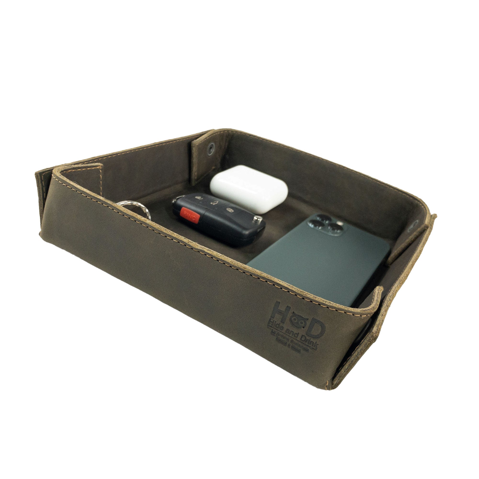 Hide & Drink Jumbo Tray crafted from full grain leather, designed for organizing small items like keys and change. This durable catchall tray embodies artisan craftsmanship from La Antigua Guatemala.