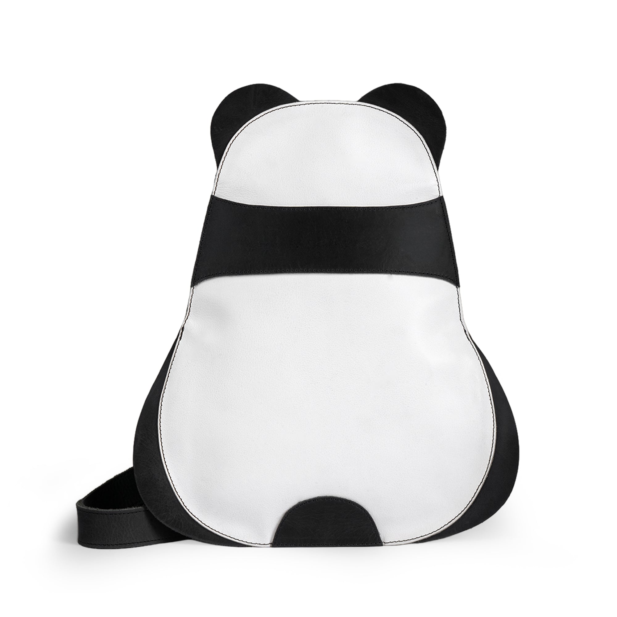 A stylish Panda-Shaped Crossbody Bag by Hide & Play, showcasing an adorable panda design made from full grain leather. Perfect for animal lovers and trendsetters, it embodies quality with small batch production, handmade in La Antigua Guatemala & Oaxaca Mexico.