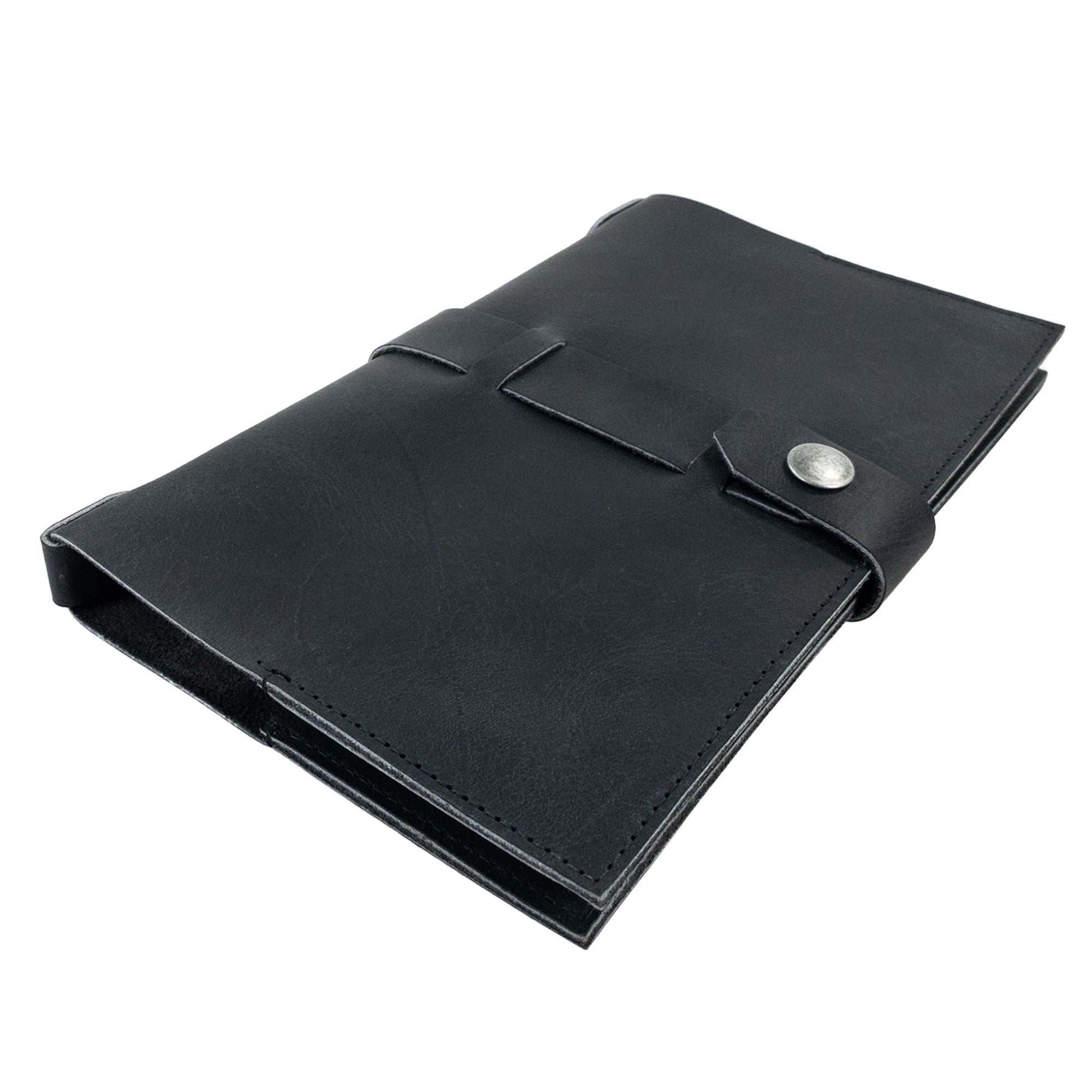 Aesthetic side perspective of Hide & Drink's Riveted Field Note Cover for Moleskine (5 x 8.25 in.) Notebook NOT Included in stunning black leather. A testament to artisan craftsmanship, this cover is handmade in La Antigua Guatemala & Oaxaca, Mexico.