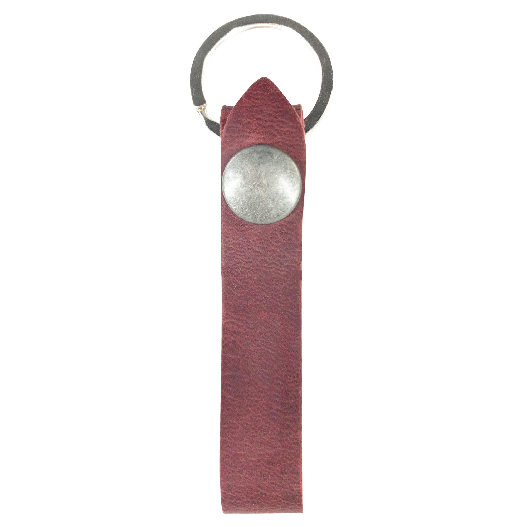 Hide & Drink Loop Keychain presented with business cards and showcasing artisan detail. This rustic keychain with belt loop is made from full grain leather, crafted in La Antigua Guatemala & Oaxaca Mexico using small batch production.