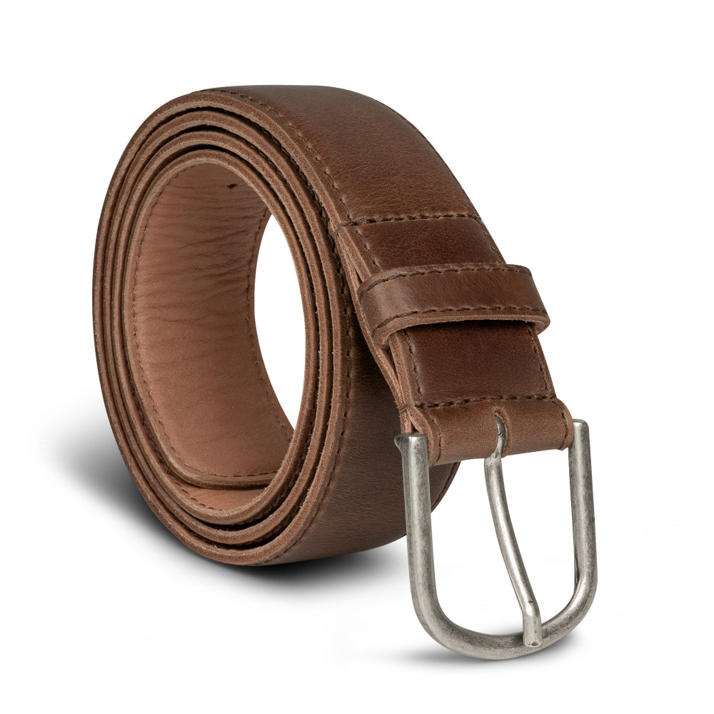 Classic Leather Belt with Glove Liner by La Leche showcases a handmade full grain leather belt for men, perfect for jeans, embodying artisan craftsmanship from La Antigua Guatemala & Oaxaca Mexico. This classic adjustable cowboy belt is hand cut and sewn, featuring fire branded details in small batch production.
