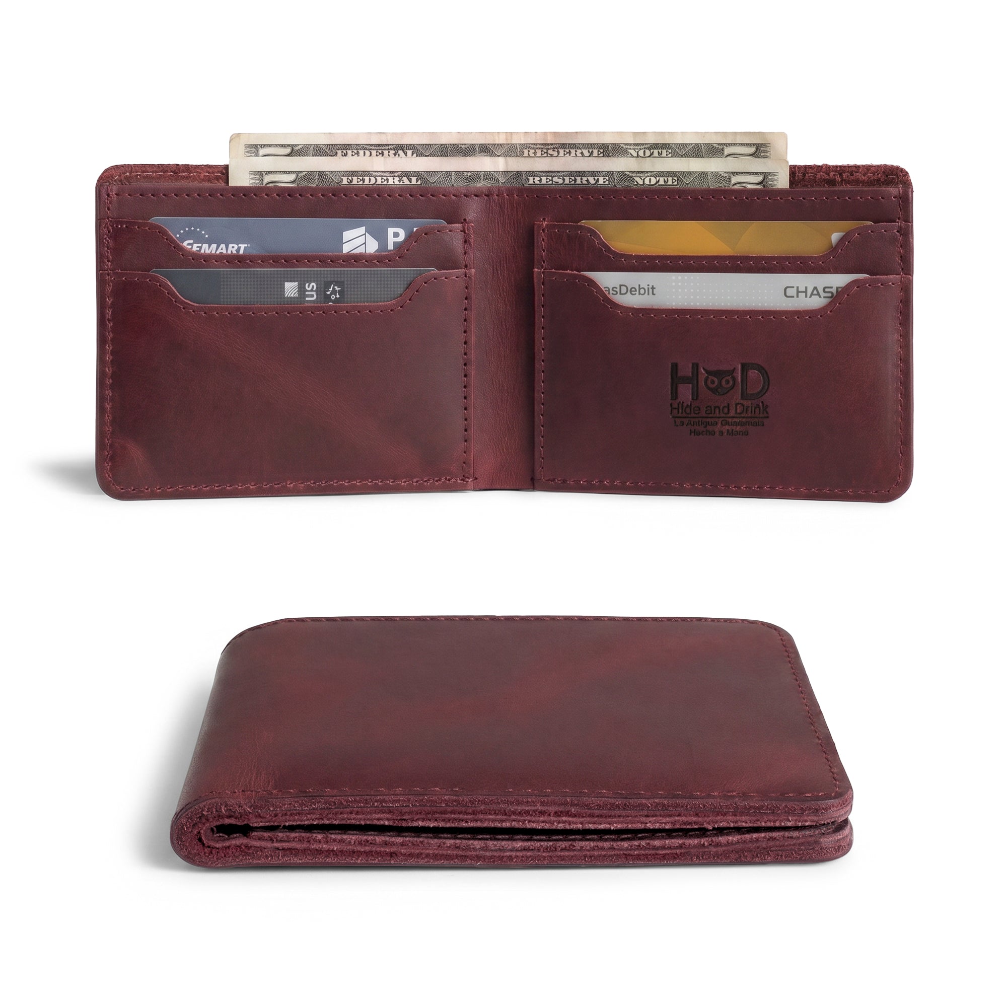 Close-up of the interior of the dark brown Classic Wallet from Hide & Drink. This Classic Bifold Wallet effectively serves as a storage case for identification, crafted from Full Grain Leather. Perfect for travel, it showcases artisan skills through small batch production methods, hand cut and sewn in La Antigua Guatemala & Oaxaca Mexico.