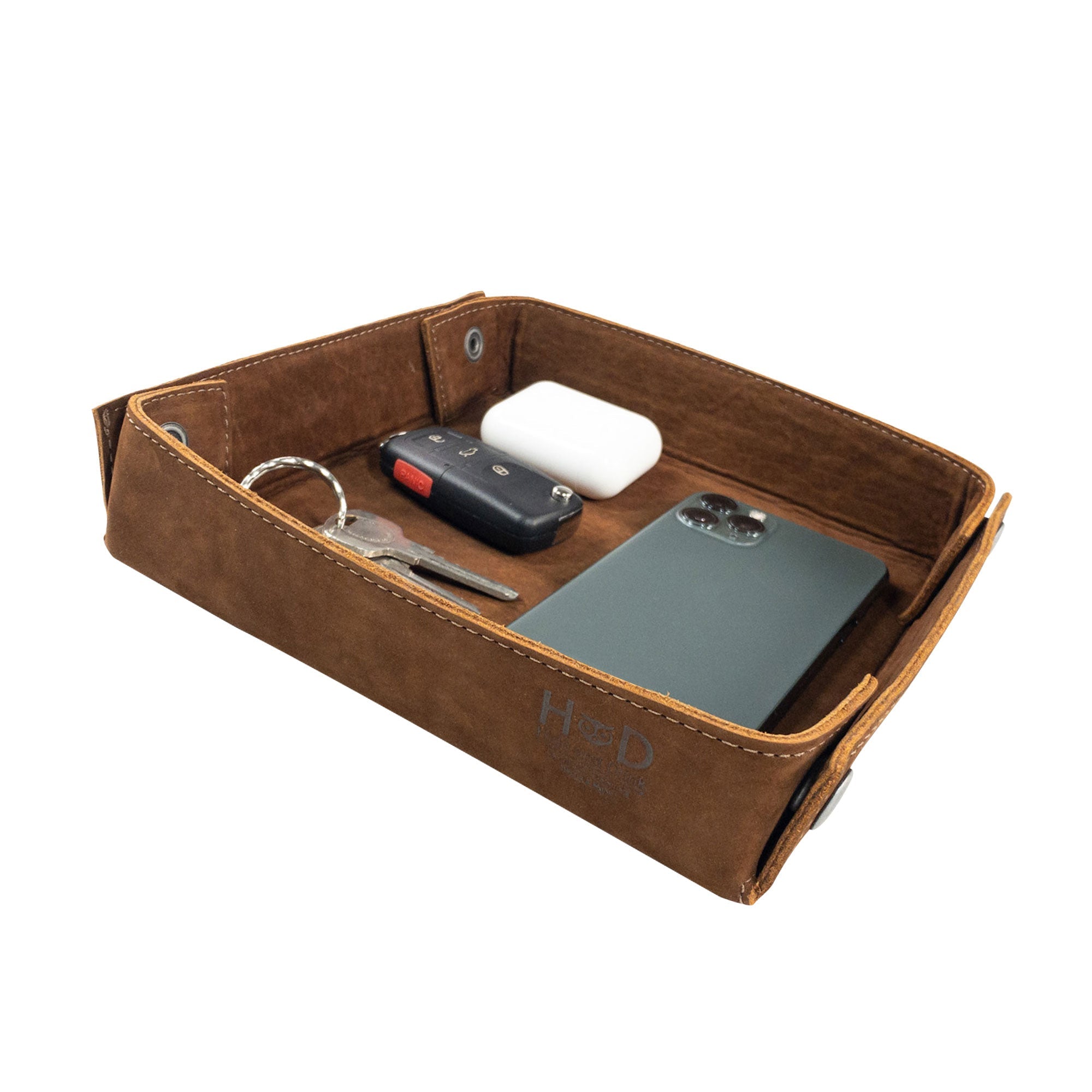Hide & Drink Jumbo Tray crafted from full grain leather, ideal for holding small items like keys and jewelry. This catchall tray is a durable and stylish organizer that emphasizes artisan craftsmanship from La Antigua Guatemala.