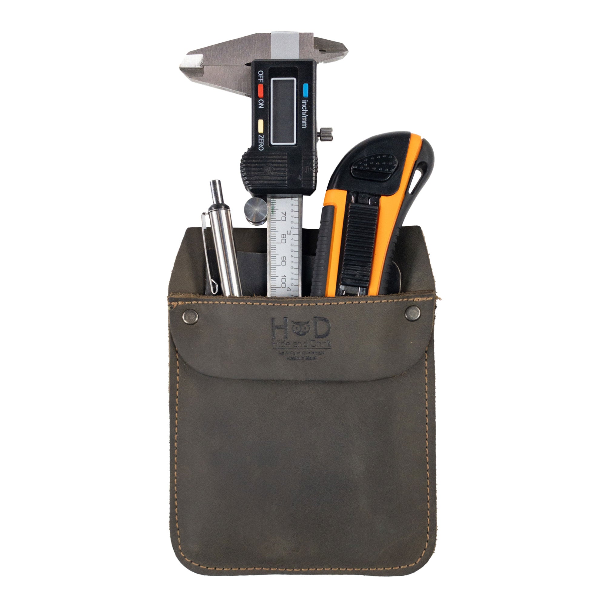 Hide & Drink Leather Work Pocket captured in a relaxed setting, showcasing its aesthetic appeal. This artisan-crafted Work Pocket Organizer for Tools combines elegance with everyday functionality.