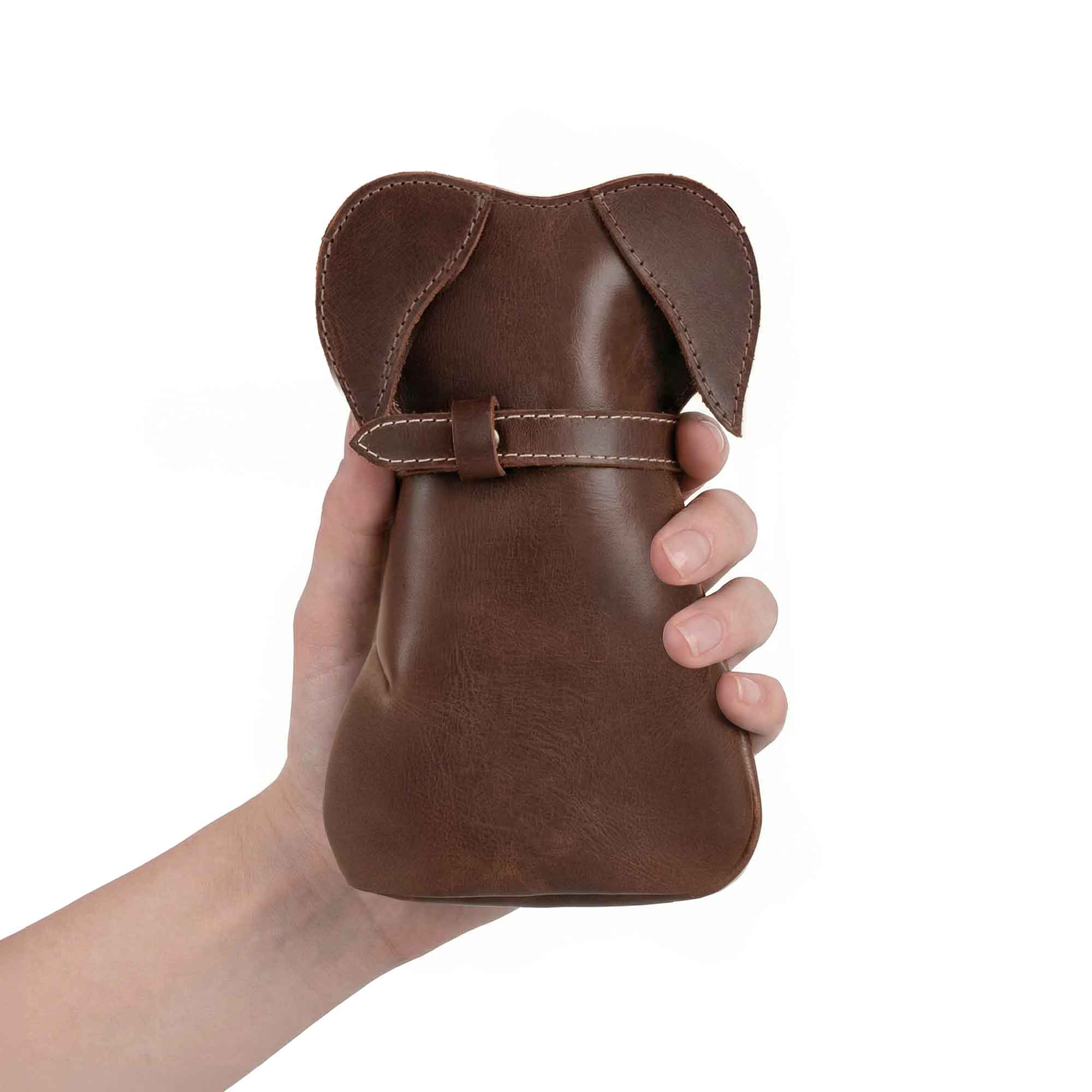 Leather Doggy Pouch by Hide & Play, showcasing a handmade Leather Doggy-Shaped Coin Pouch Piggy Bank. This Cash Holder Organizer is crafted from Full Grain Leather, perfect for both men and women as a stylish Coin Purse, Money Saving Box, and Men's Change Purses & Pouches. Ideal as a Small Mens Wallet for Coins, featuring exquisite handmade craftsmanship from La Antigua Guatemala and Oaxaca Mexico.