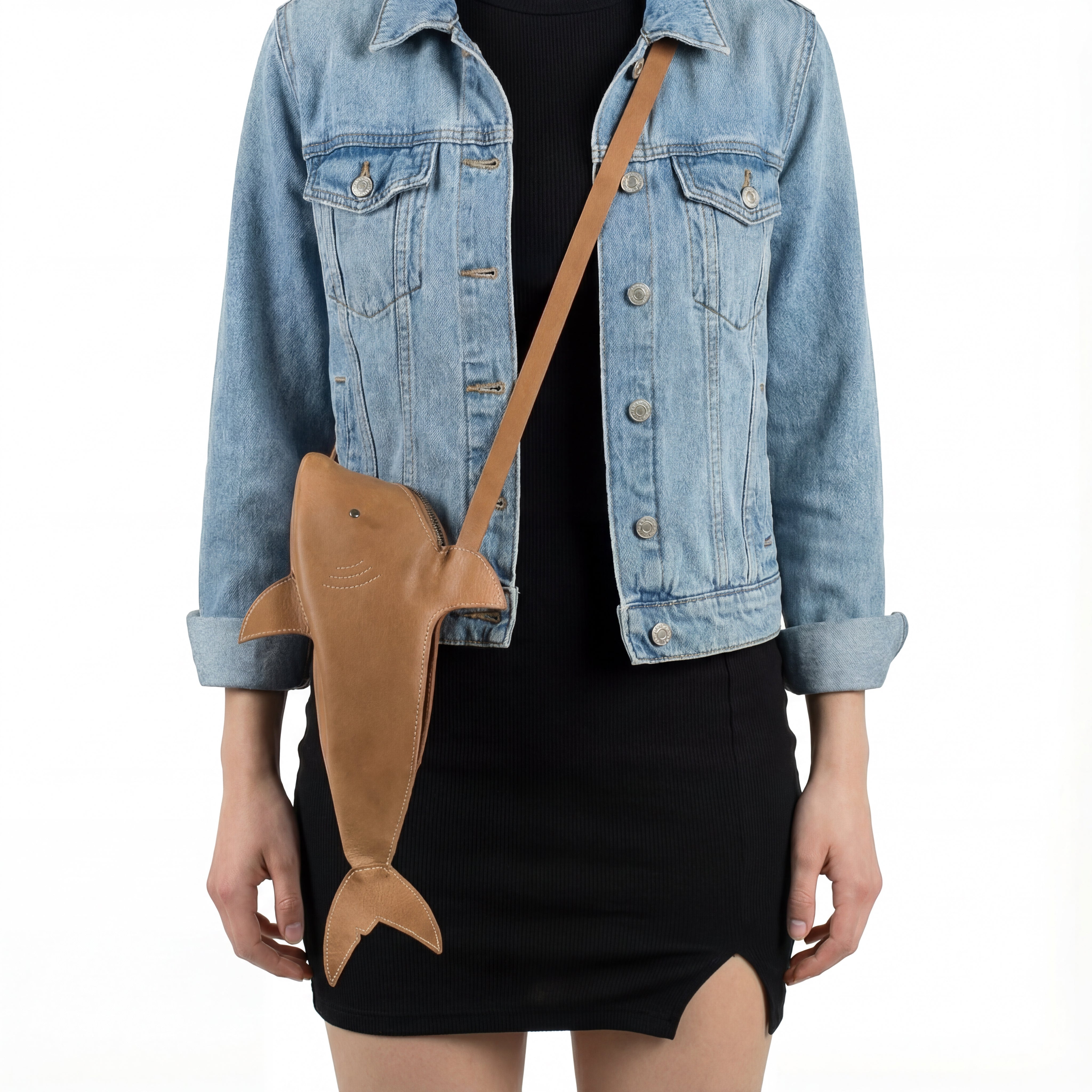 Stylish Shark-Shaped Shoulder Bag by Tudi Frudi displayed on a model, highlighting its adjustable strap suitable for crossbody or messenger styles, crafted from Full Grain Leather with a focus on small batch production and handmade quality.