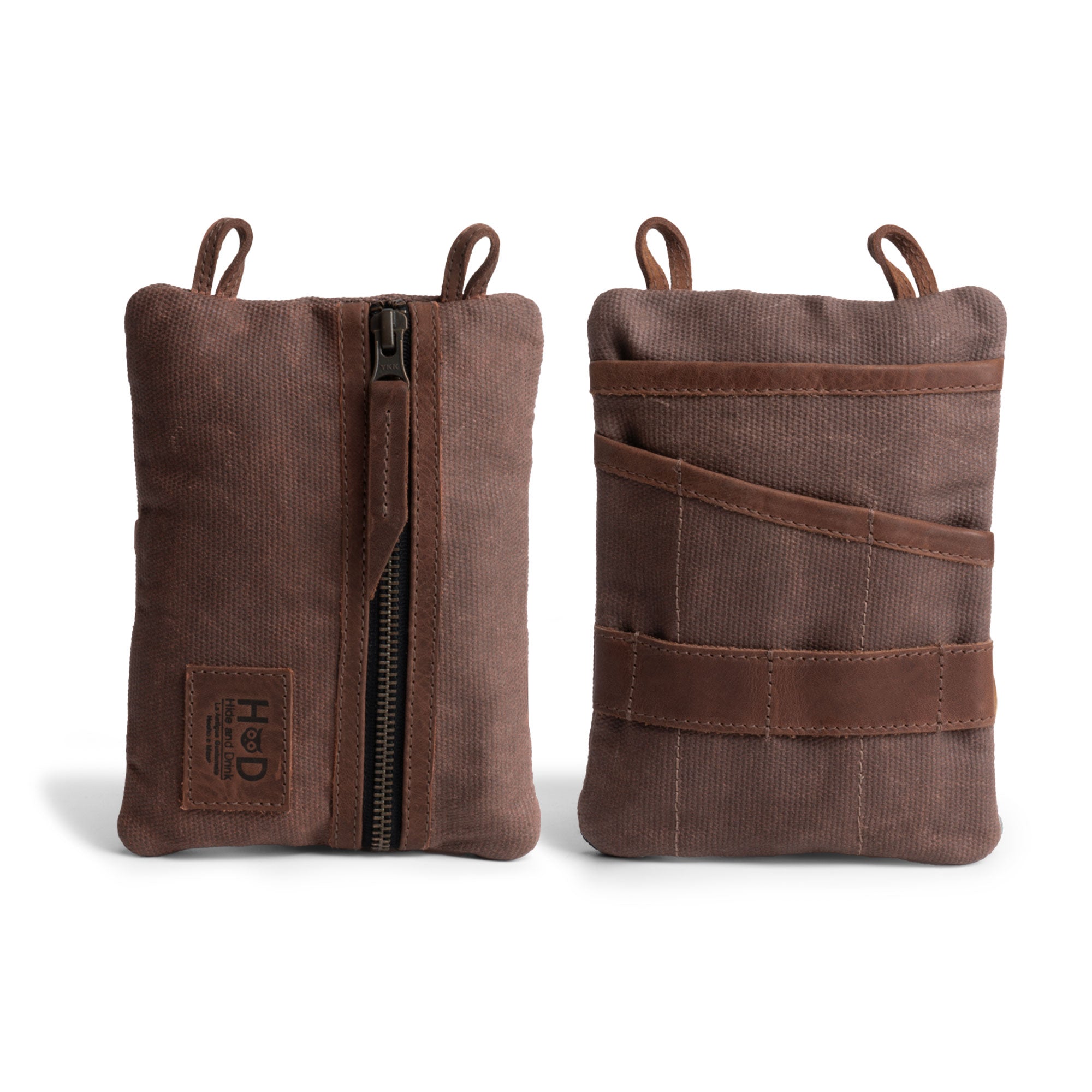 Back view of the brown Multi-tool Pocket Pouch - XL by Hide & Drink, illustrating its distinctive sleeve pockets for organization, crafted with quality materials. Multi-Tool Pocket Pouch XL, Compact Multipurpose EDC Zippered Bag, Knife Holster, Handmade Slim Organizer, Waxed Canvas, StockyardX, Small Batch Production, Artisan, Handmade in La Antigua Guatemala & Oaxaca Mexico.