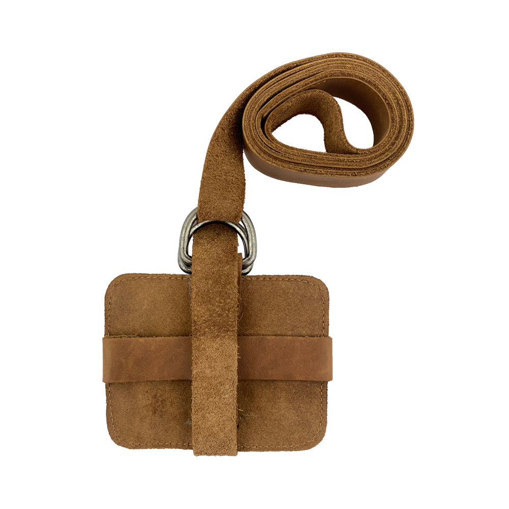 Another angle of the Hide & Drink Book Strap Carrier displaying its sleek silhouette. This Full Grain Leather carrier is artisan-made in La Antigua Guatemala, perfect for stylish individuals seeking practical solutions.