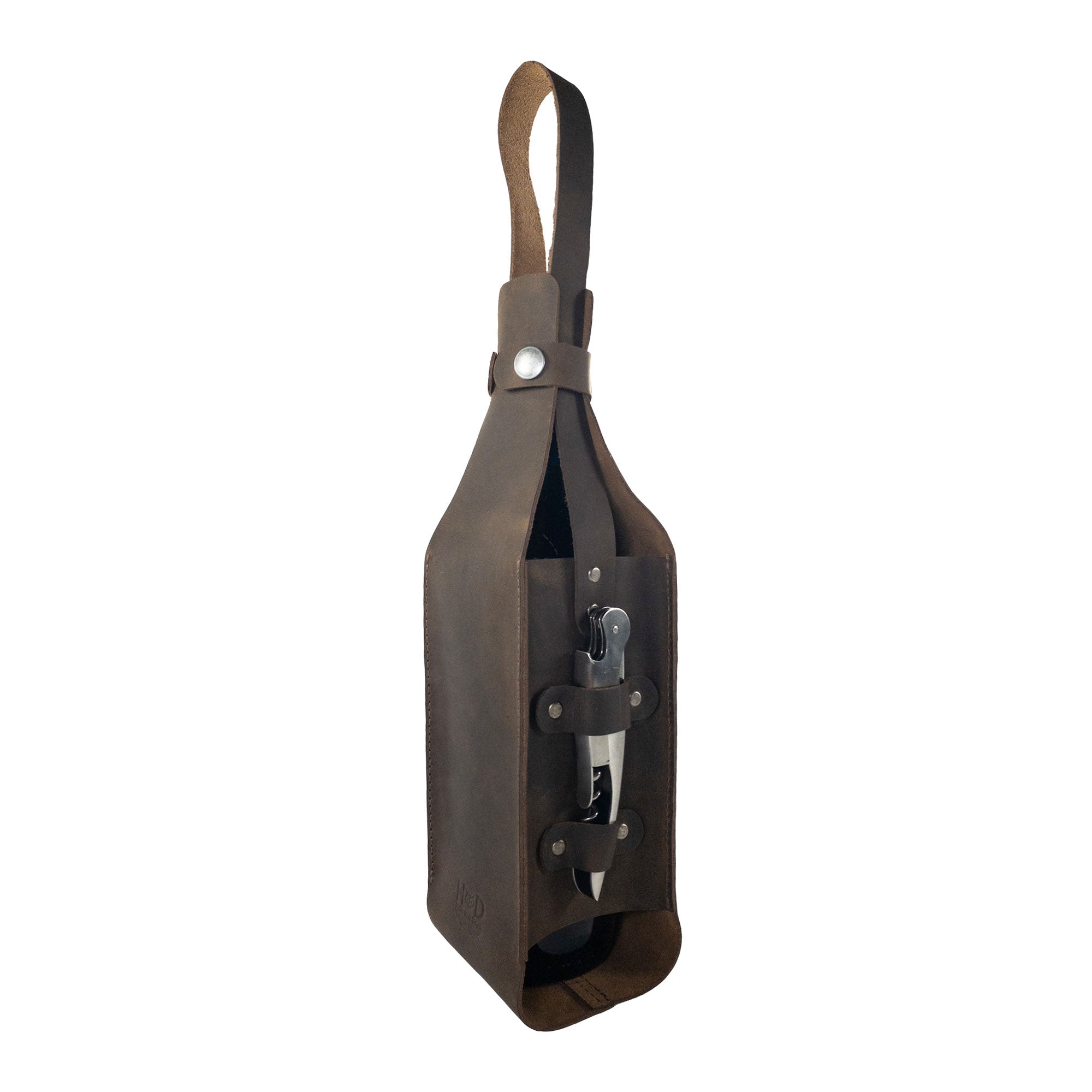 Stylish side view of Hide & Drink's Single Bottle Wine Carrier made from Full Grain Leather. This Handmade leather piece, part of their Small Batch Production, highlights the artisanal skills of local craftsmen in La Antigua Guatemala & Oaxaca Mexico, combining elegance with durability in a Single Bottle Wine Carrier.
