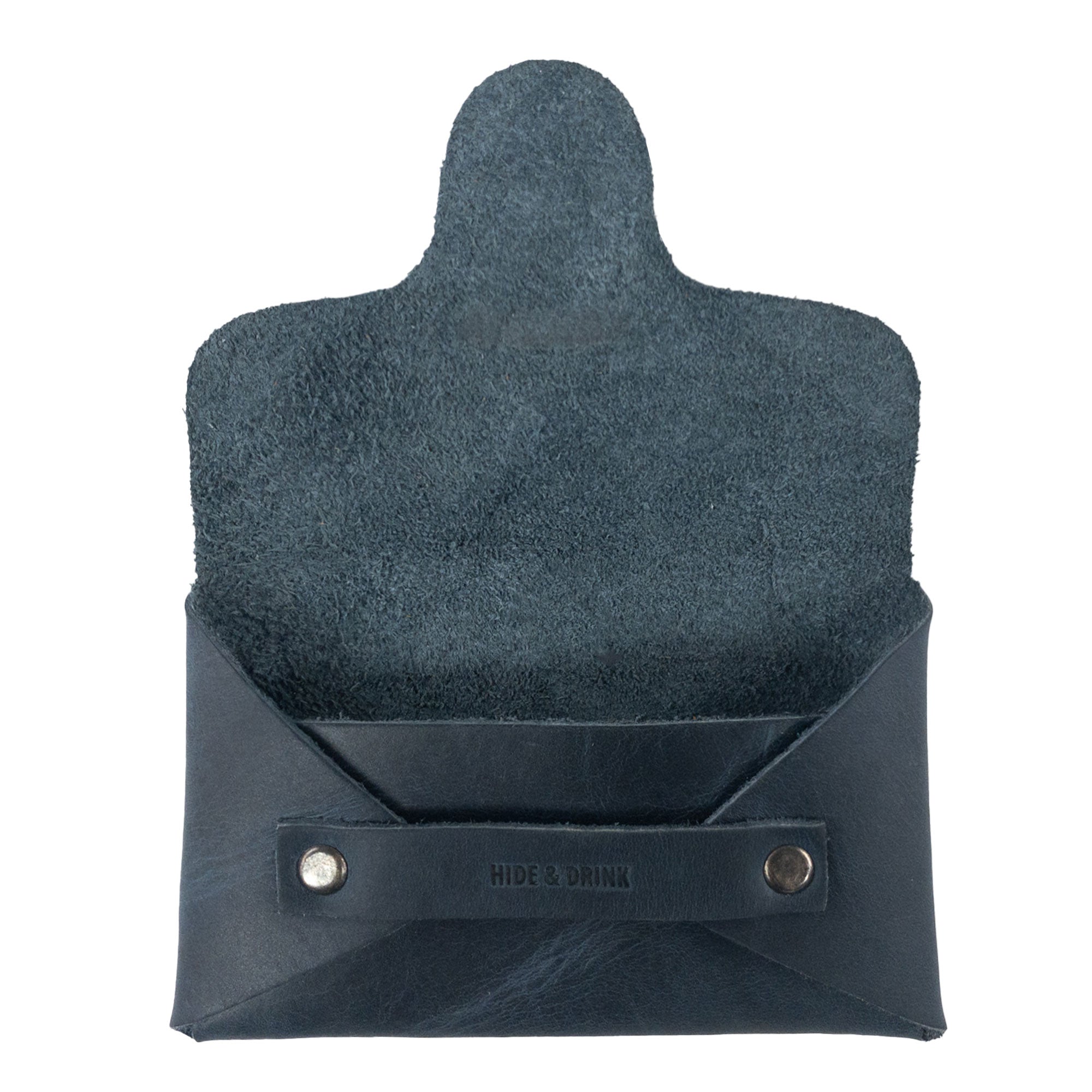 The interior of a Snapless Business Card Holder by Hide & Drink, highlighting its practical layout. This vintage wallet, designed for men and women, is crafted from durable Full Grain Leather, serving effectively as a sturdy pouch and money organizer, reflecting the artisan craftsmanship from La Antigua Guatemala and Oaxaca Mexico.