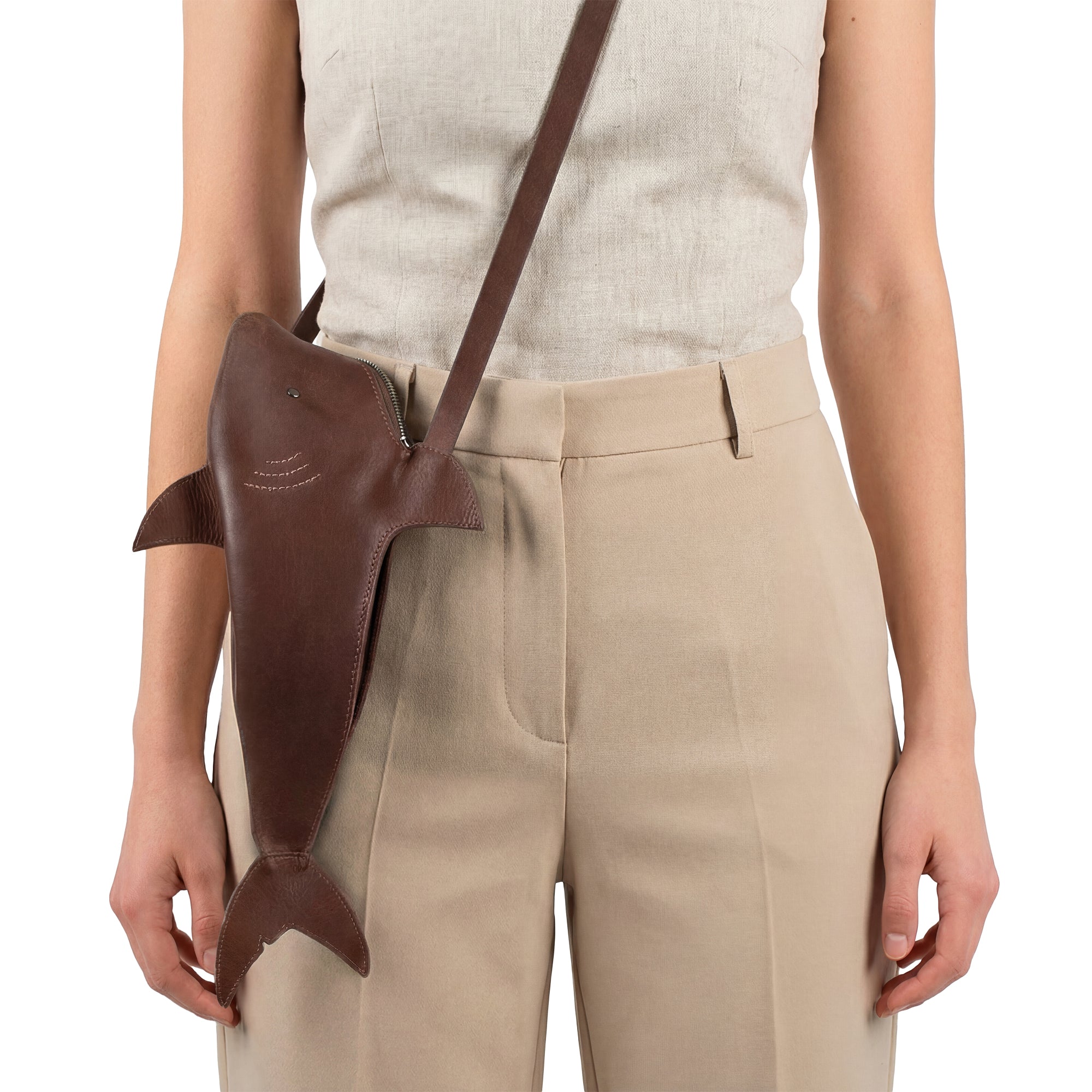 Fashionable Shark-Shaped Shoulder Bag from Tudi Frudi, worn as a crossbody bag, crafted from premium Full Grain Leather, designed for versatile use and small batch production, highlighting artisan skills through hand cut and hand sewn techniques.