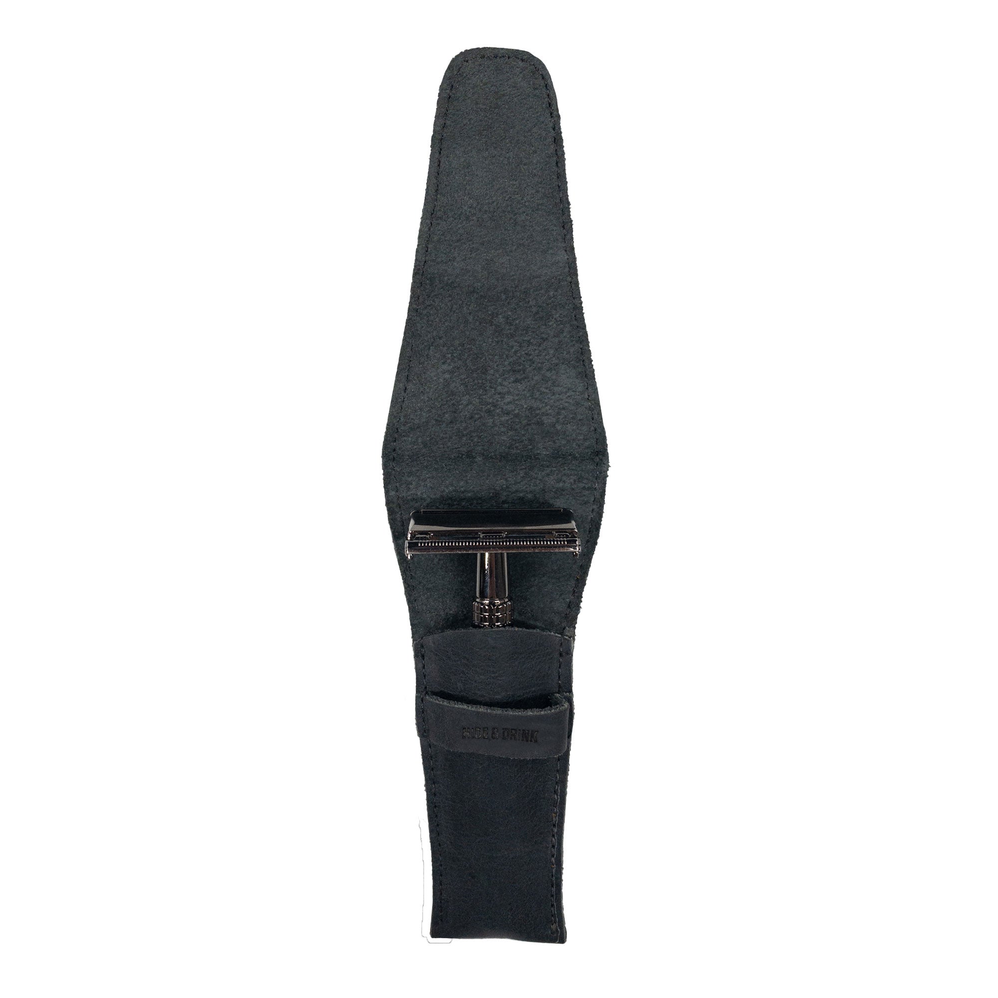 An inside view of the black Safety Razor Case by Hide & Drink, designed to hold razors carefully. Made with artisan skills from full grain leather, this case is ideal for personal care and shaving accessories, handmade in La Antigua Guatemala and Oaxaca Mexico.