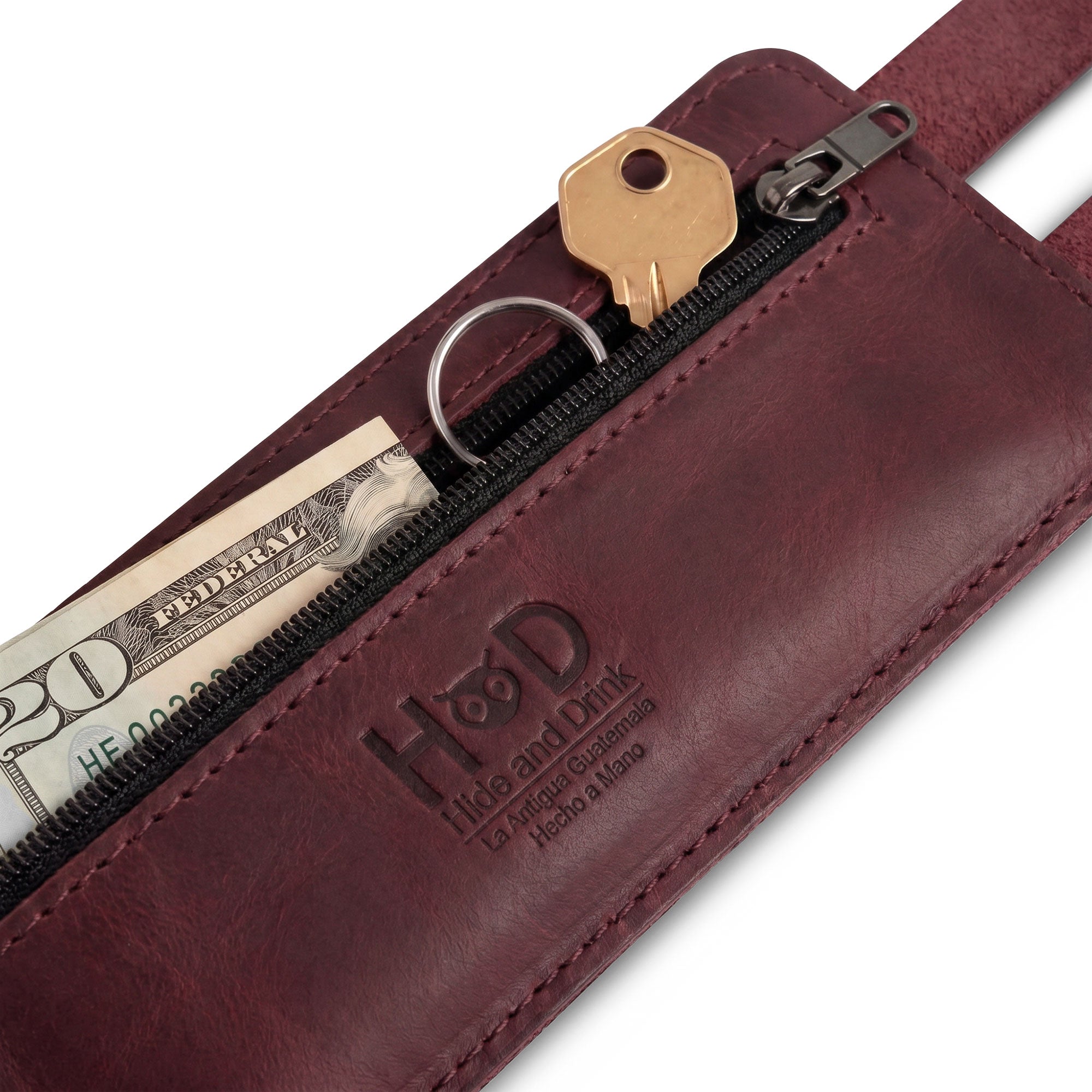 Hide & Drink's Wrist-Wallet-Cuff, crafted in Full Grain Leather, offers a beautiful rustic leather bracelet design. Featuring a hidden pouch for bills and an inner zippered pouch, it combines practicality with elegance. Handcrafted in La Antigua Guatemala & Oaxaca Mexico, each piece reflects artisan quality and attention to detail.