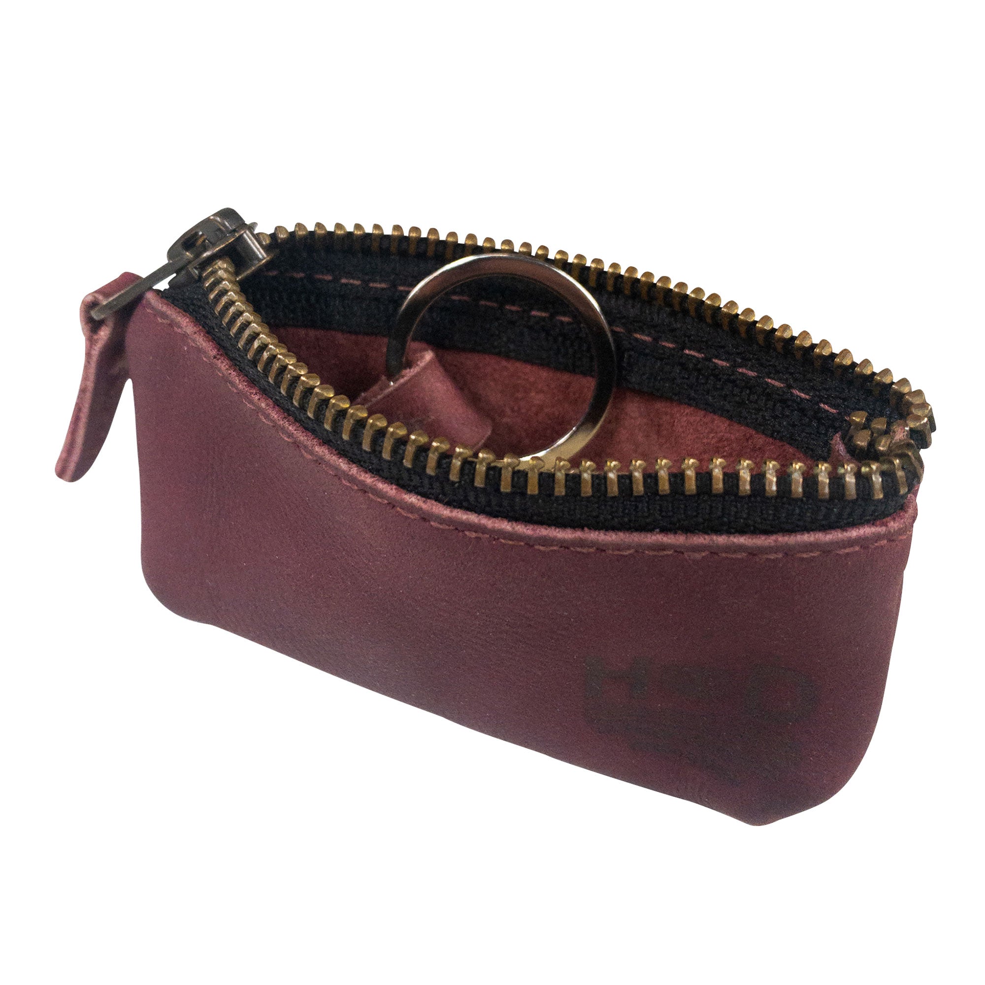 Hide & Drink Key Holder Zippered Pouch interior showcasing its careful design for organizing small items like keys or charging cables. Handcut and hand sewn in La Antigua Guatemala & Oaxaca Mexico.