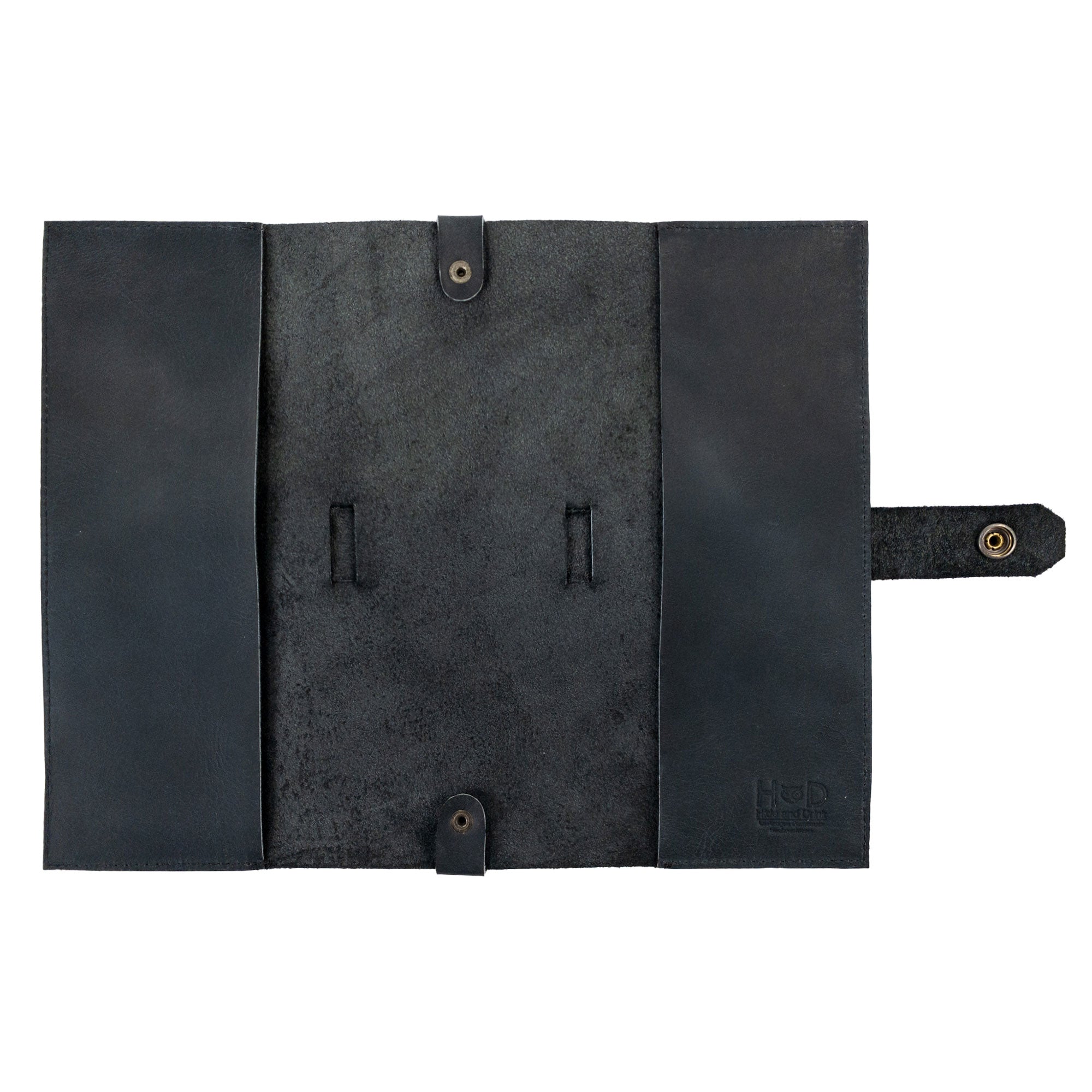 Interior lining of Hide & Drink's Riveted Field Note Cover for Moleskine (5 x 8.25 in.) Notebook NOT Included, prominently featuring the luxurious full grain leather feel. This hand-cut creation is proudly made through small batch production in La Antigua Guatemala & Oaxaca, Mexico.