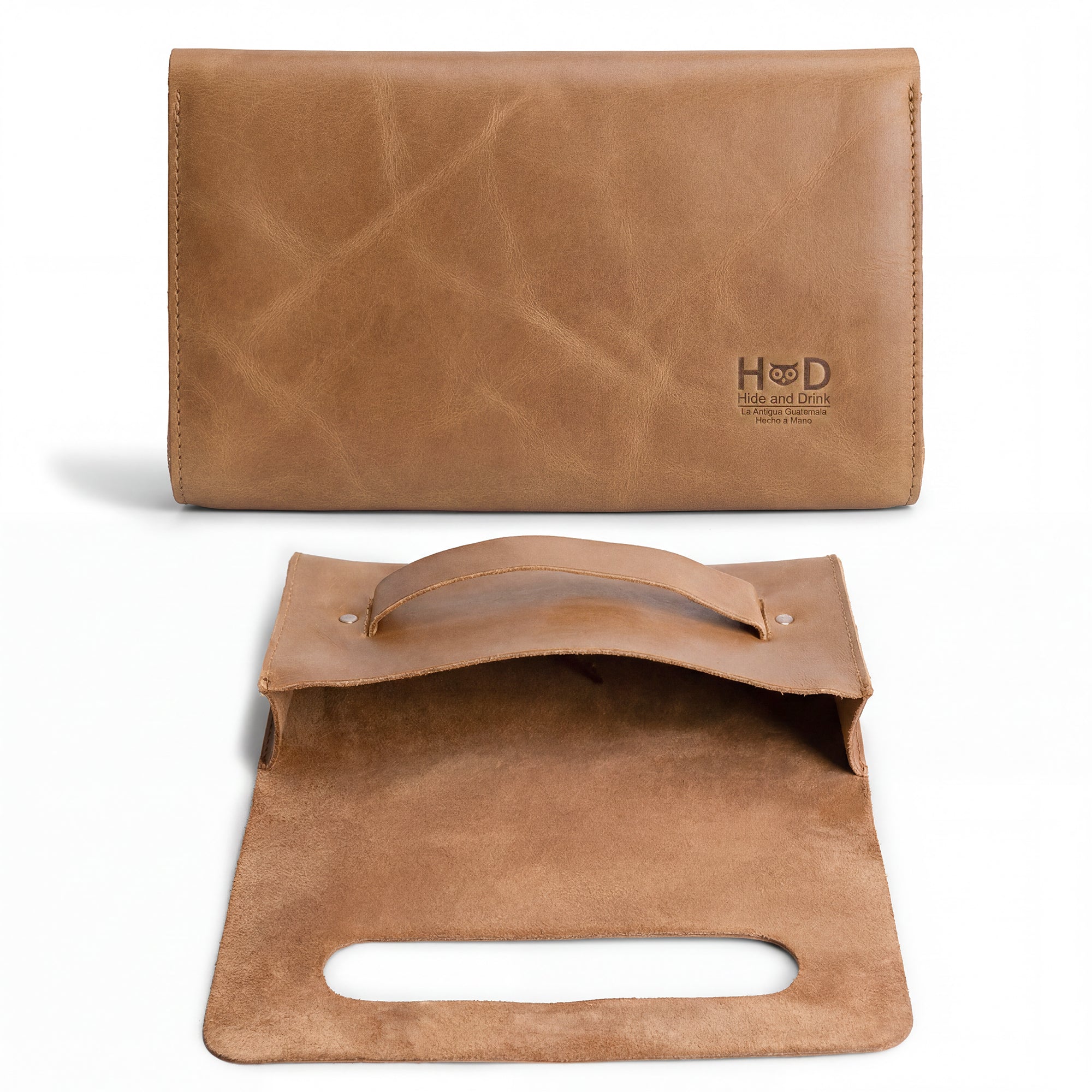 Open view of the brown Clutch Bag With Handle by Hide & Drink, highlighting its elegant design. This Full Grain Leather Clutch Bag is perfect for women as a stylish handbag or night bag, crafted in Guatemala and Mexico.