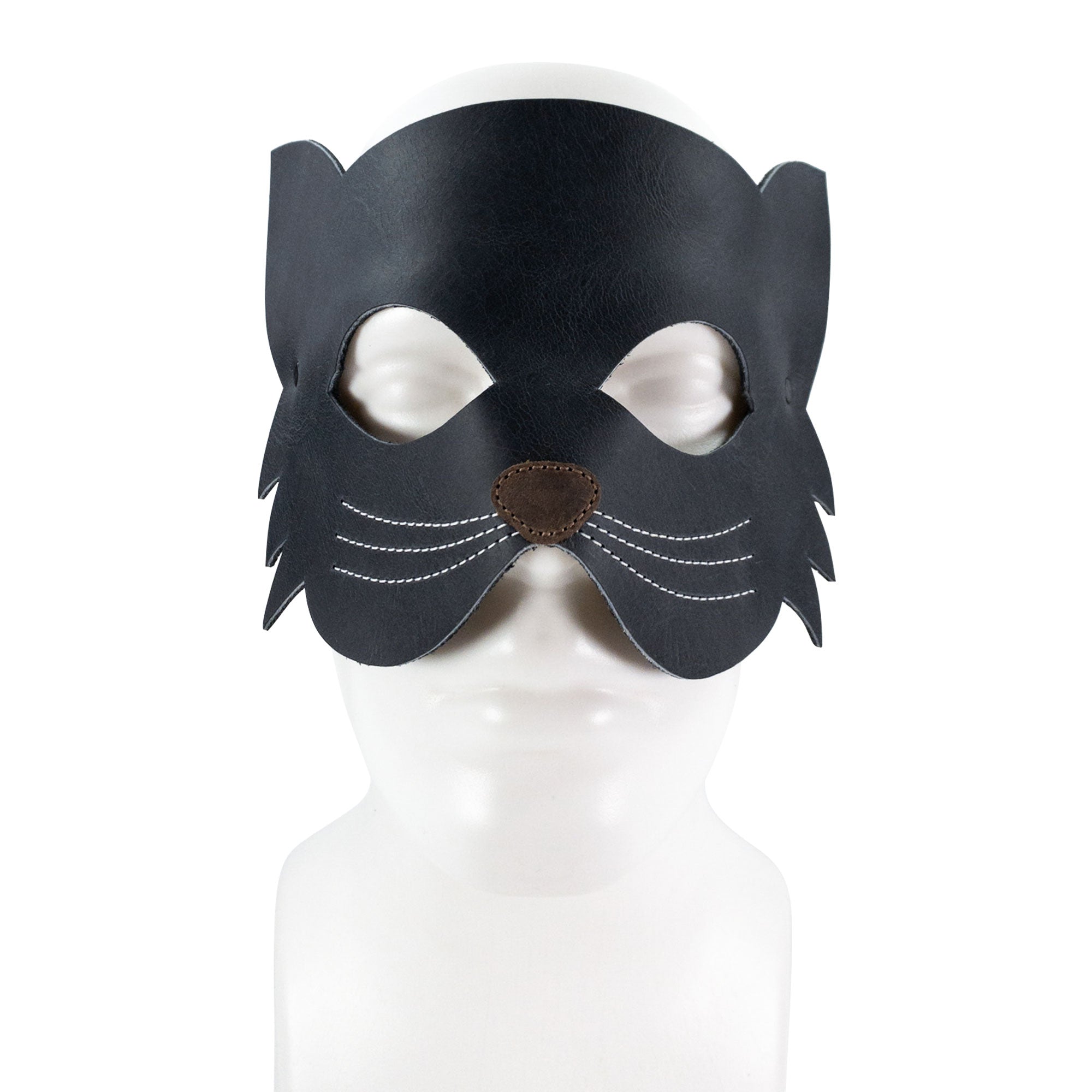 Front view of the Cat Shape Face Mask by Hide & Play, made from premium full grain leather. This artisan accessory combines fun and functionality, ideal for themed events. Handmade in La Antigua Guatemala, it exemplifies the beauty of small batch production with fire branded details and meticulous hand sewing.