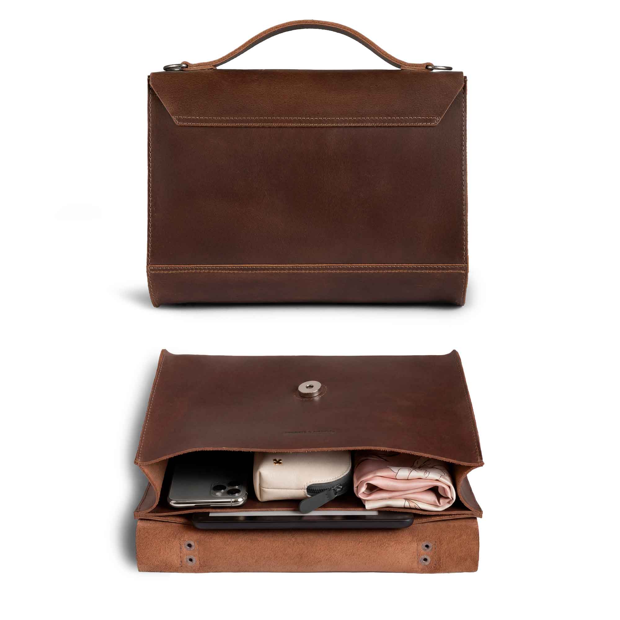 The interior of The Burnet Crossbody by Austin Genuine, highlighting its spacious design and full grain leather craftsmanship. This purse is a testament to small batch production with hand cut and hand sewn details, proudly made in La Antigua Guatemala & Oaxaca Mexico.