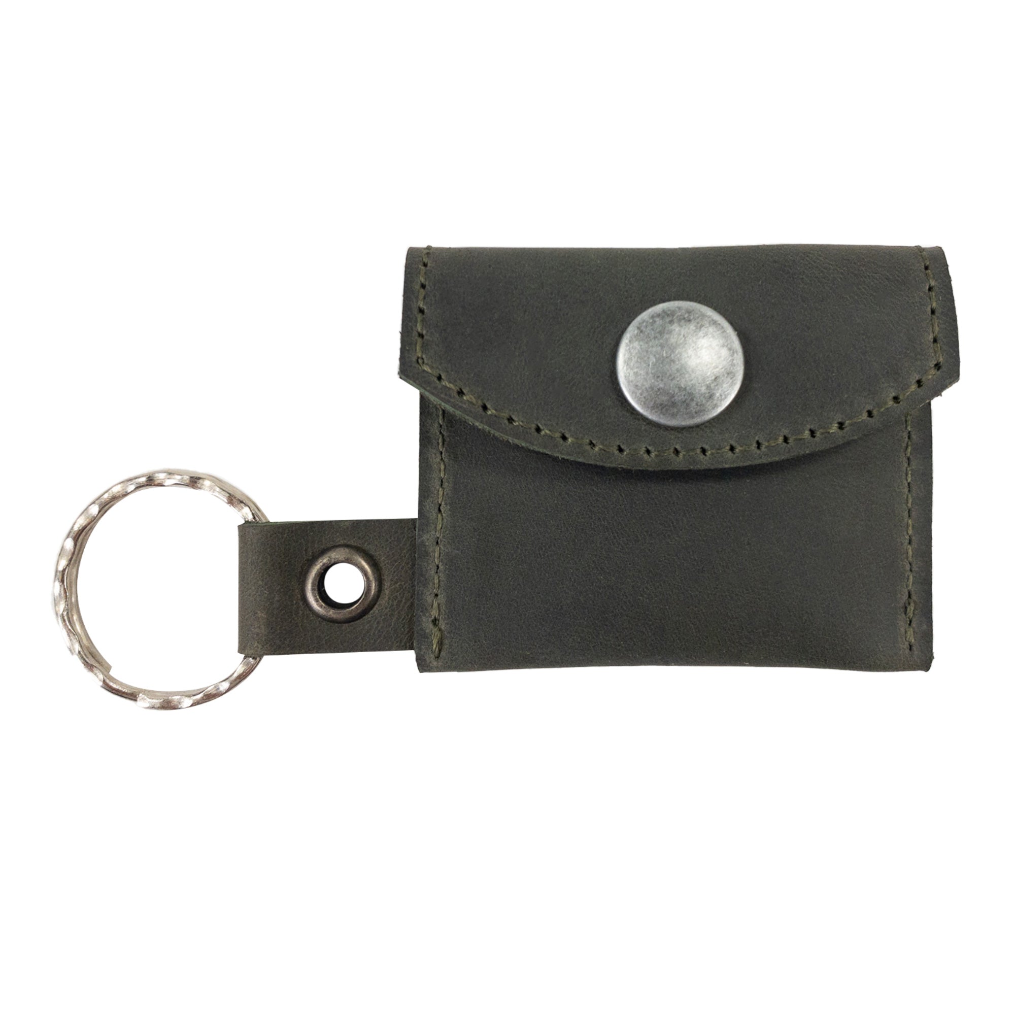 A tan version of the Tiny Coin Holder Keychain by Hide & Drink, designed with durability for everyday use. Constructed of Full Grain Leather, this Tiny Coin Holder represents artisan small batch production from La Antigua Guatemala.