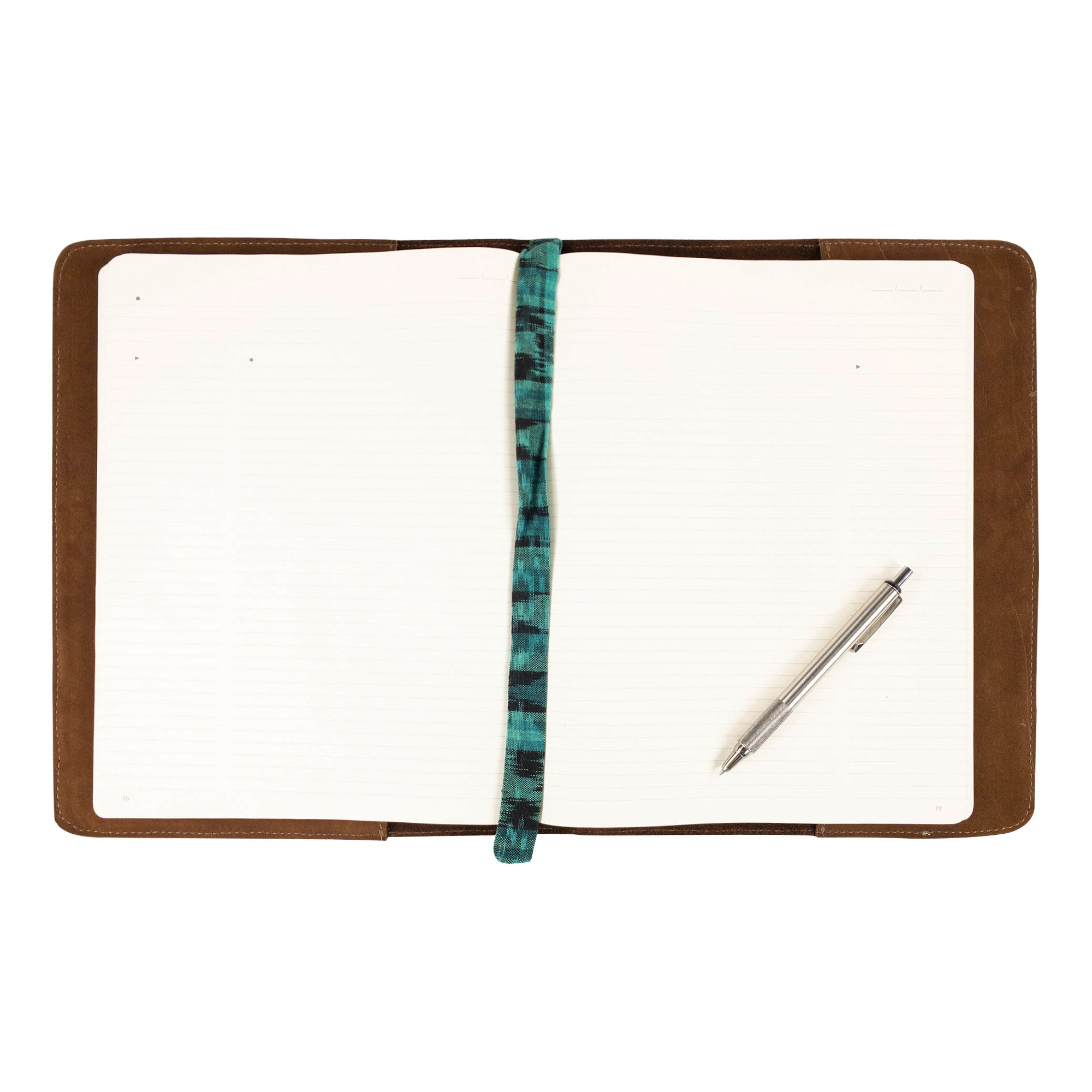A detailed view of the Journal Cover for (8.5 x 11 in.) Moleskine Cahier XXL by Hide & Drink, featuring its chic design and robust leather quality. Ideal for anyone looking for a fine leather accessory, handmade in La Antigua Guatemala & Oaxaca Mexico.