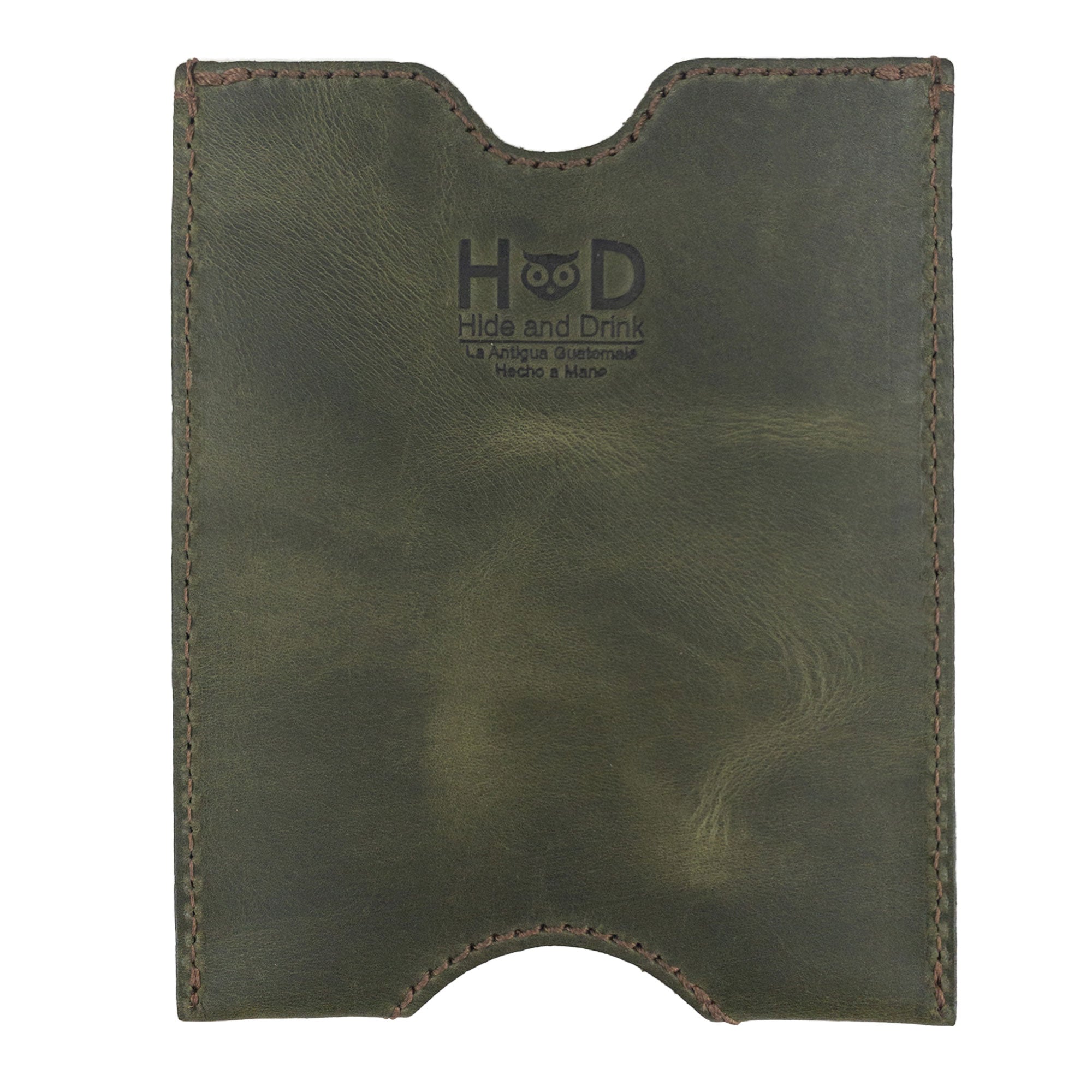 Front view of Hide & Drink Passport Sleeve in rich green Full Grain Leather, showcasing its durable and elegant design. This Travel Passport Pocket Sleeve is handcrafted in La Antigua Guatemala.
