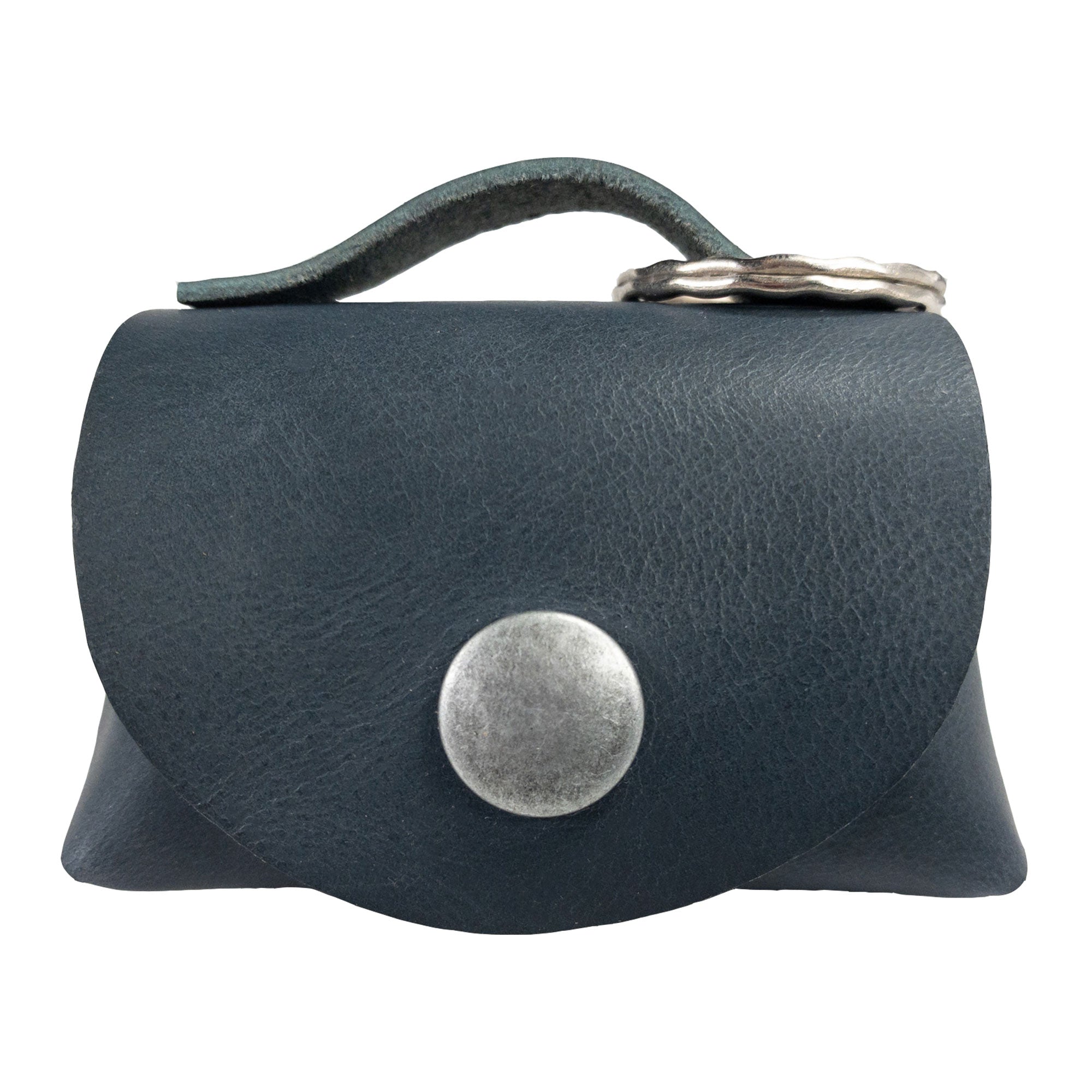 Front view of the Tiny Handbag Keychain by Hide & Drink, featuring a key ring holder and made from durable Full Grain Leather. Ideal for anyone looking for a handmade accessory with artisan flair, this product from StockyardX highlights exceptional craftsmanship from Oaxaca Mexico.