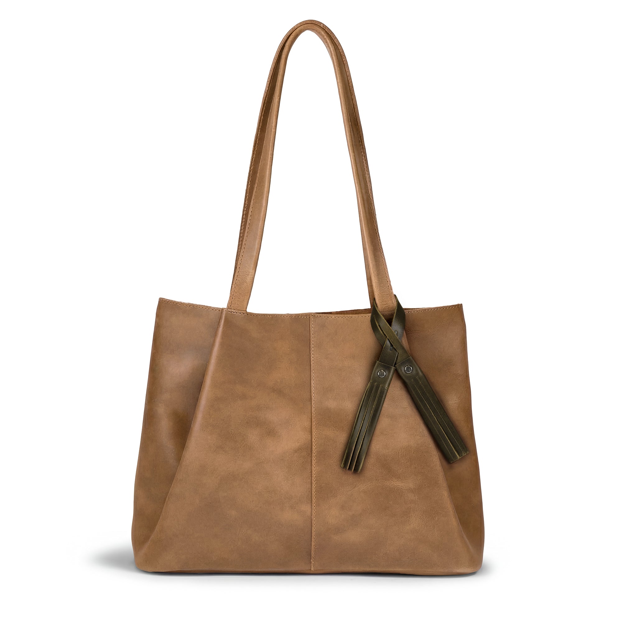 Tassel Bag Charm Dark Jade attached to a stylish brown tote by Hide & Drink. This purse charm enhances the bag's aesthetics, making it a chic ornament for women. Crafted from full grain leather, it embodies artisan craftsmanship and is handmade in La Antigua Guatemala & Oaxaca Mexico.