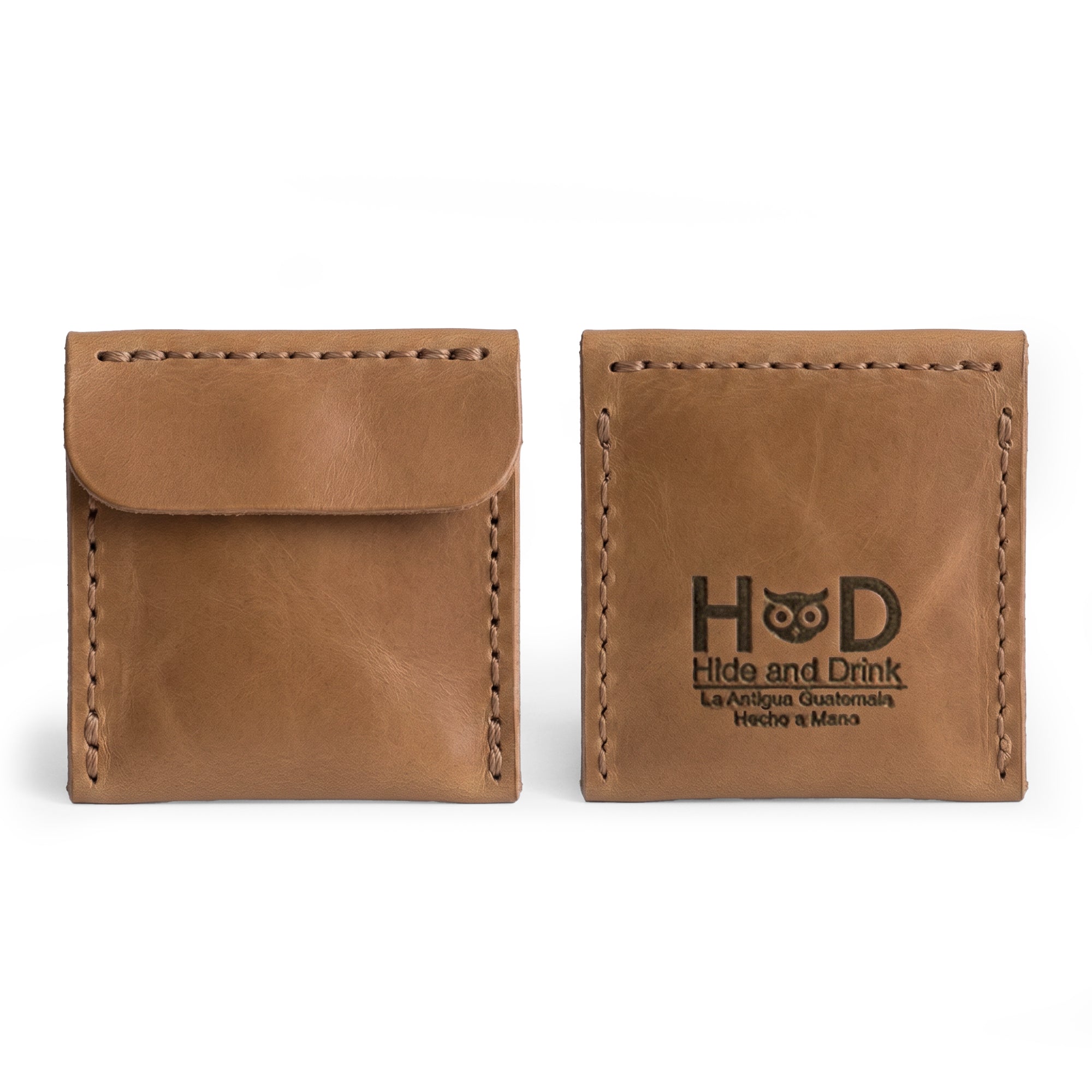 Stylish front of the Hide & Drink Wedding Ring Case made from beautiful tan full grain leather. A small batch production piece suitable as a pouch organizer for travel or showcasing engagement rings, hand cut and sewn in La Antigua Guatemala & Oaxaca Mexico.