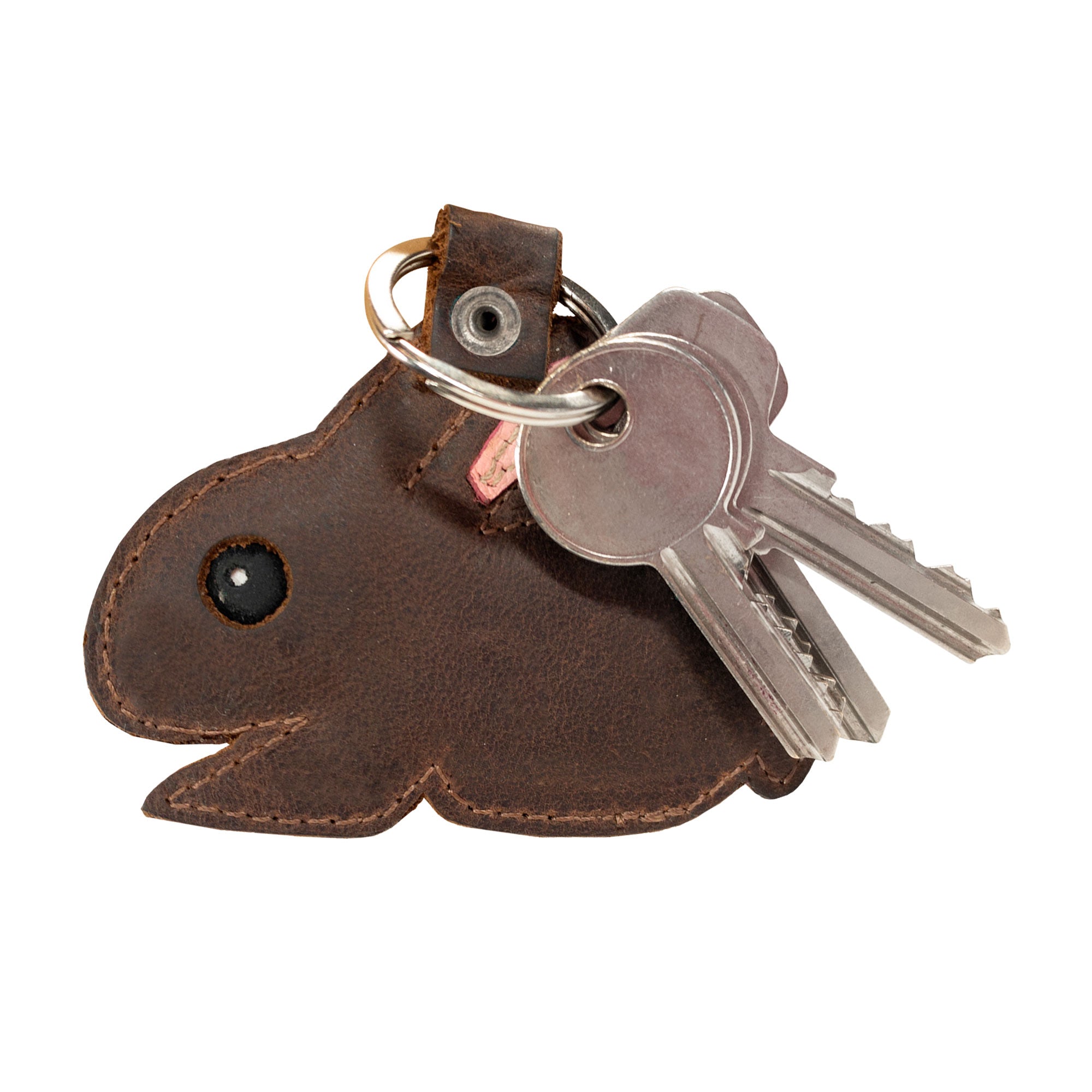 Side view of the bunny Critter Key Chain by Hide & Drink, displaying its adorable features and quality craftsmanship. This Animal Key Ring Holder is perfect for those who love cute designs, made from premium Full Grain Leather. Handmade in La Antigua Guatemala & Oaxaca Mexico.