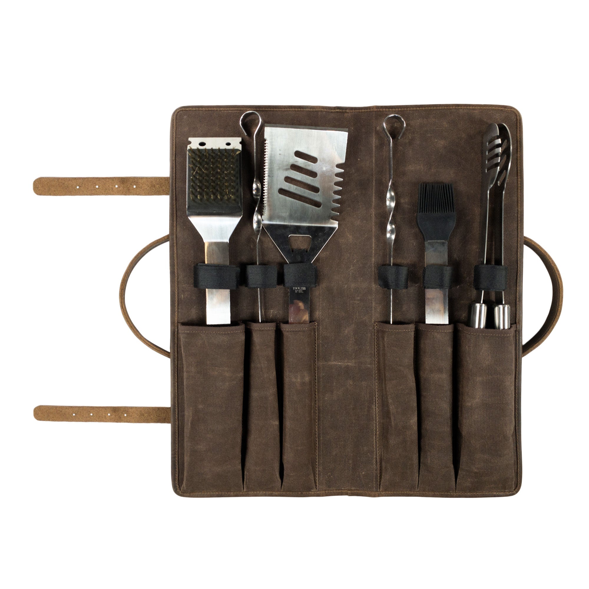 Close-up of Cast Leather Co. Grill Tool Holder (Tools NOT included), featuring a well-organized interior for grill tools. This BBQ grilling accessories carry bag is made from durable full grain leather and water-resistant waxed canvas, ideal for carrying grilling gear while camping. A handmade item from artisans in La Antigua Guatemala and Oaxaca Mexico, showcasing quality craftsmanship.