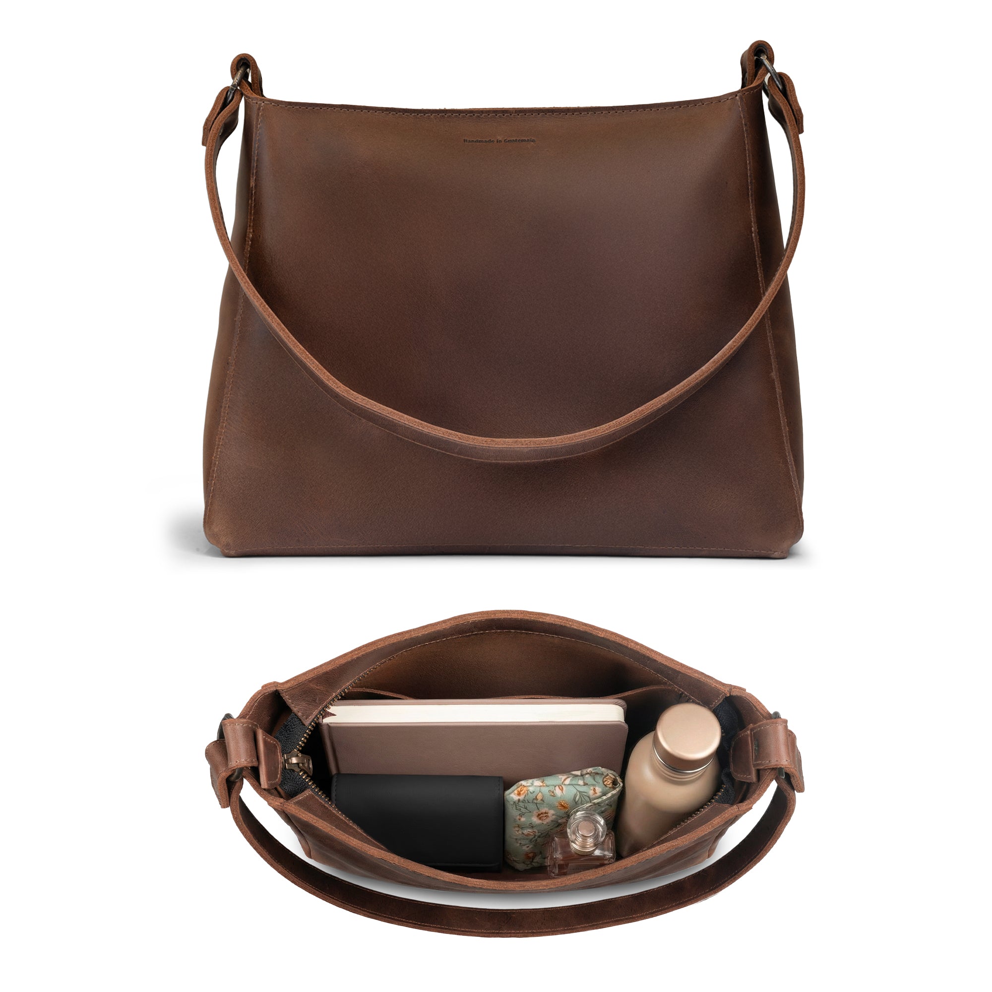 Inside view of The Allandale Tote Bag by Austin Genuine, demonstrating its spacious interior made from full grain leather. This artisan bag is crafted through small batch production, hand cut, hand sewn, and fire branded, reflecting exceptional quality and is handmade in La Antigua Guatemala & Oaxaca Mexico.